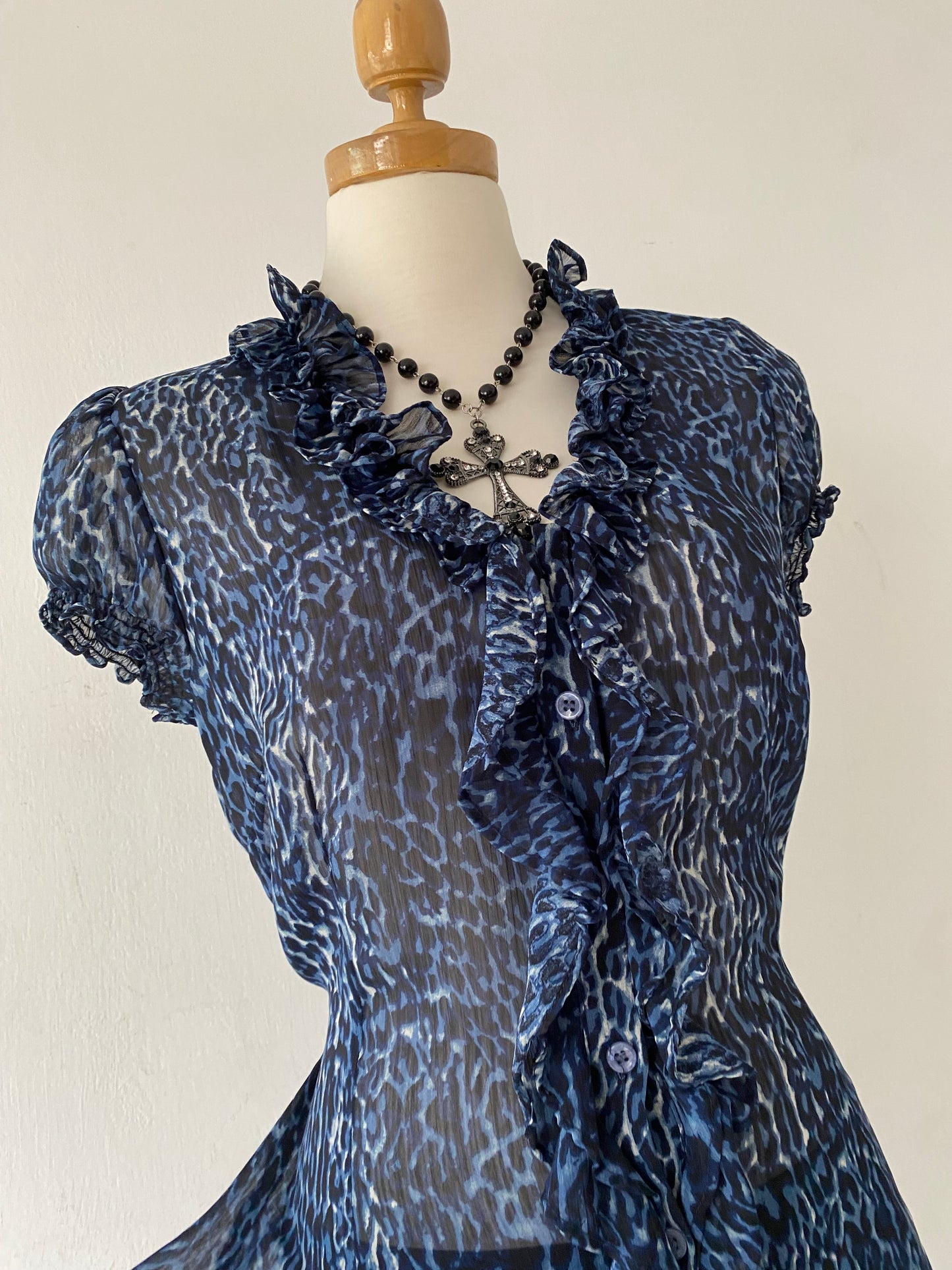 Cheetah print blouse with bow on the back