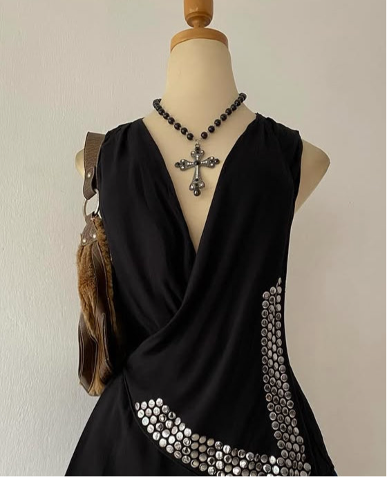 Black top with silver appliqués