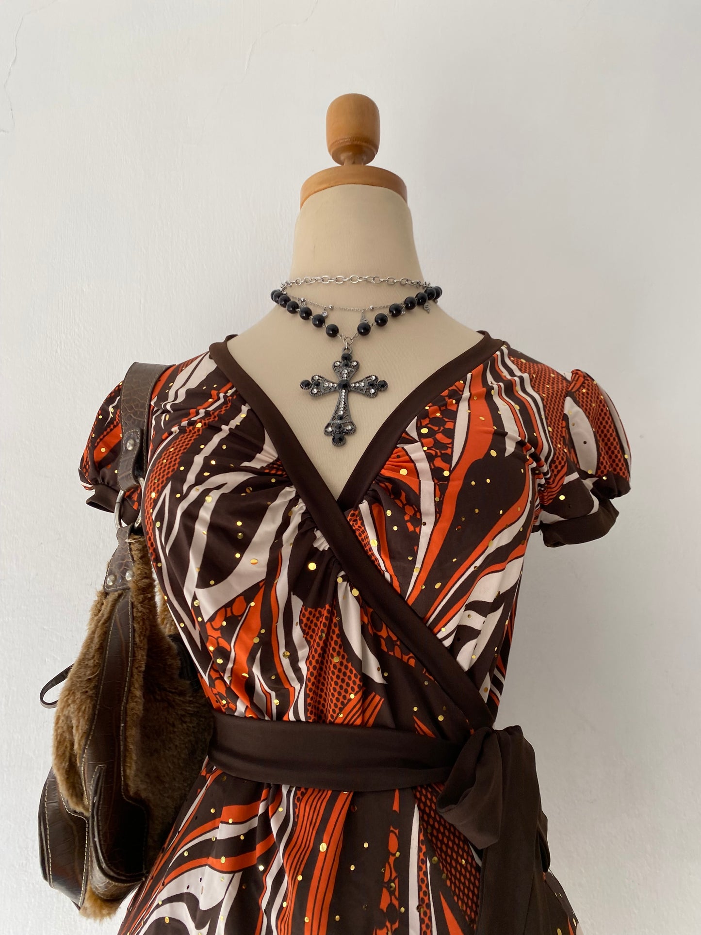 Adorable wrap top with bow