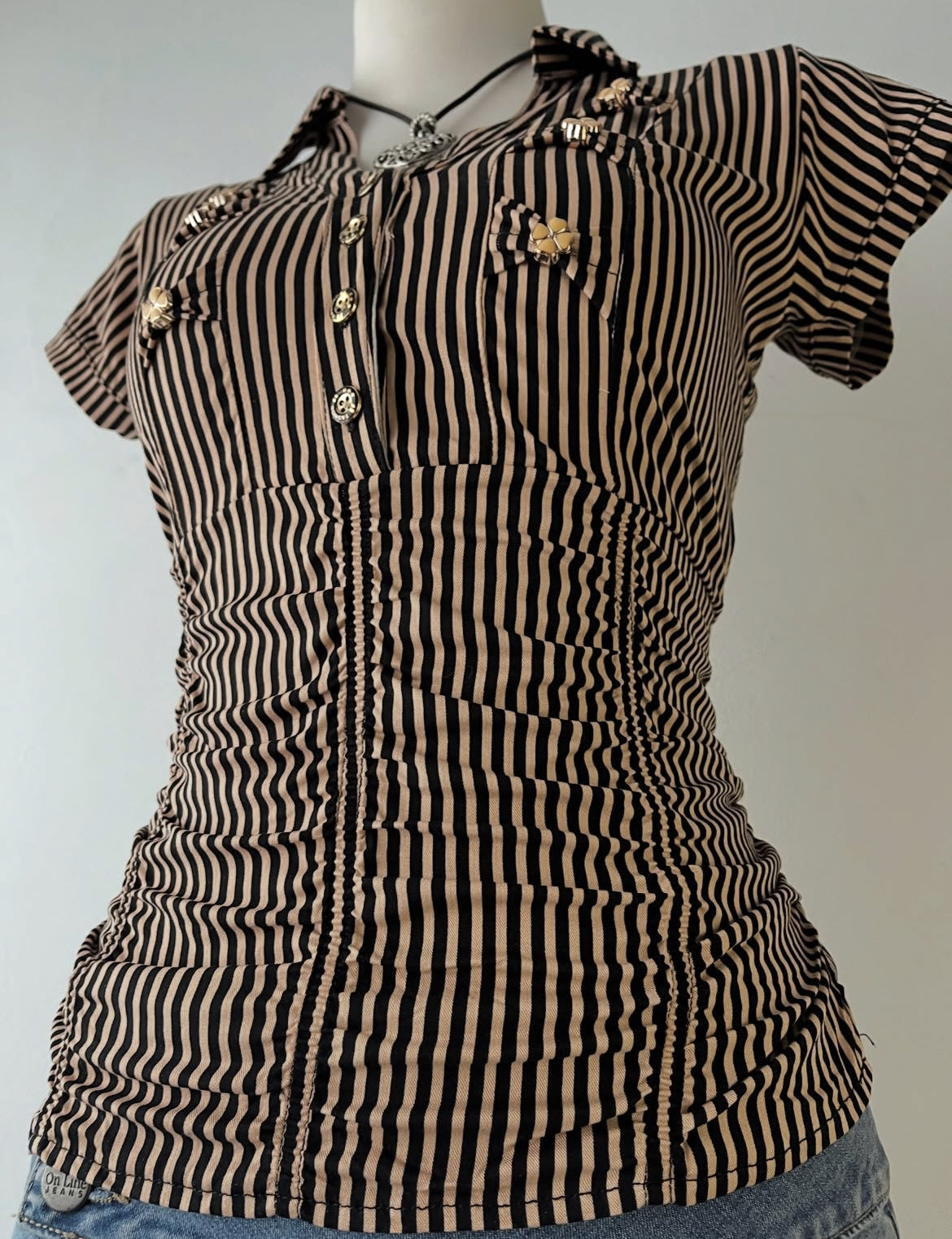 Striped blouse with bows