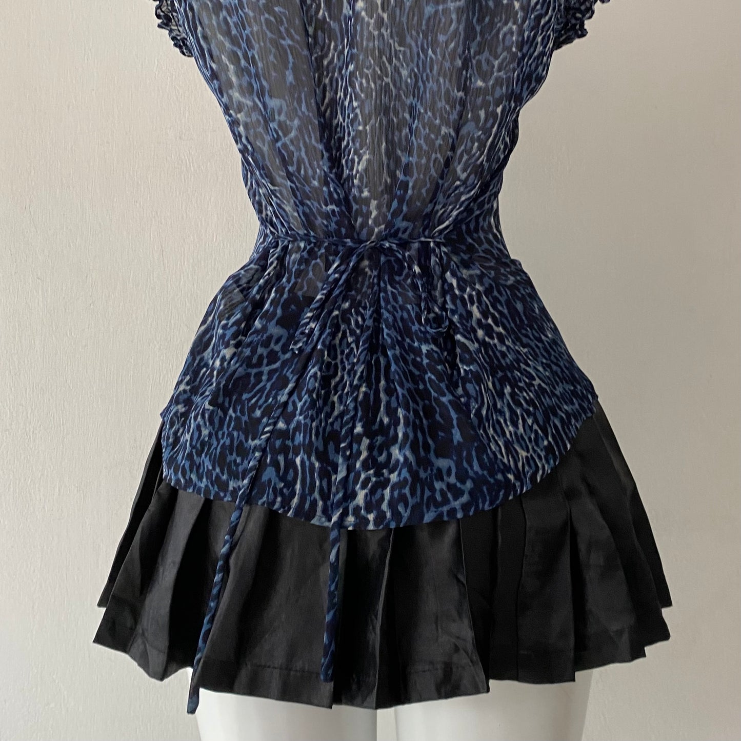Cheetah print blouse with bow on the back