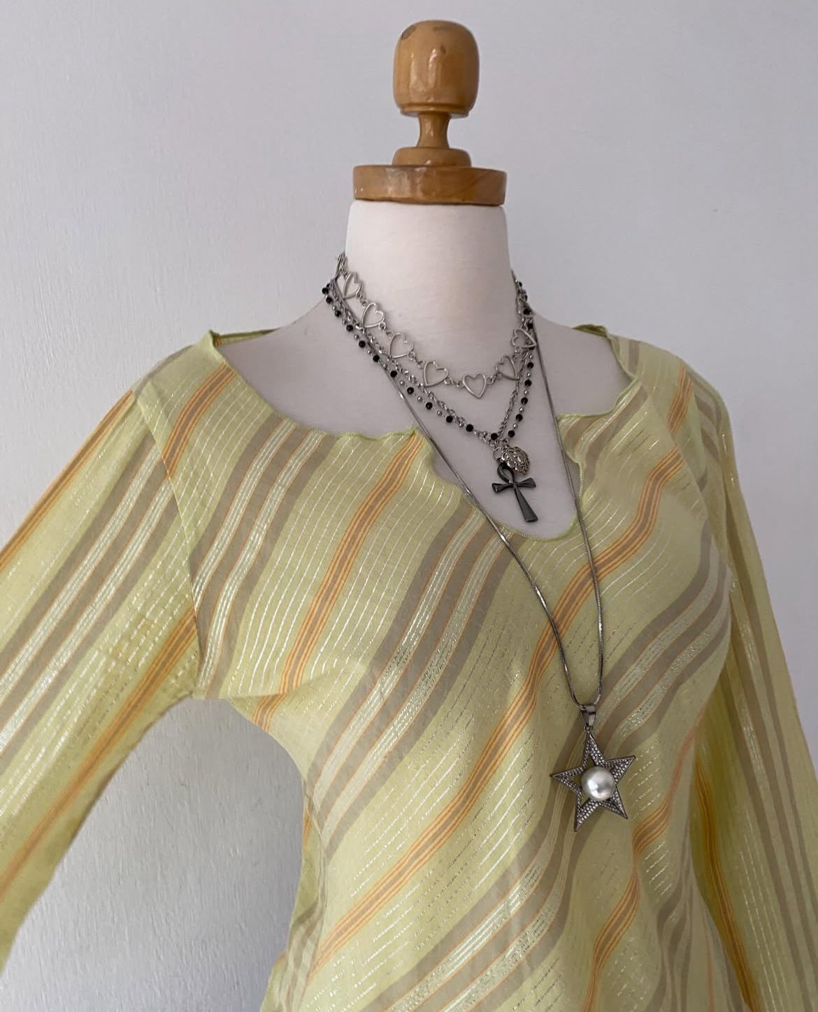 Striped bell-sleeved top