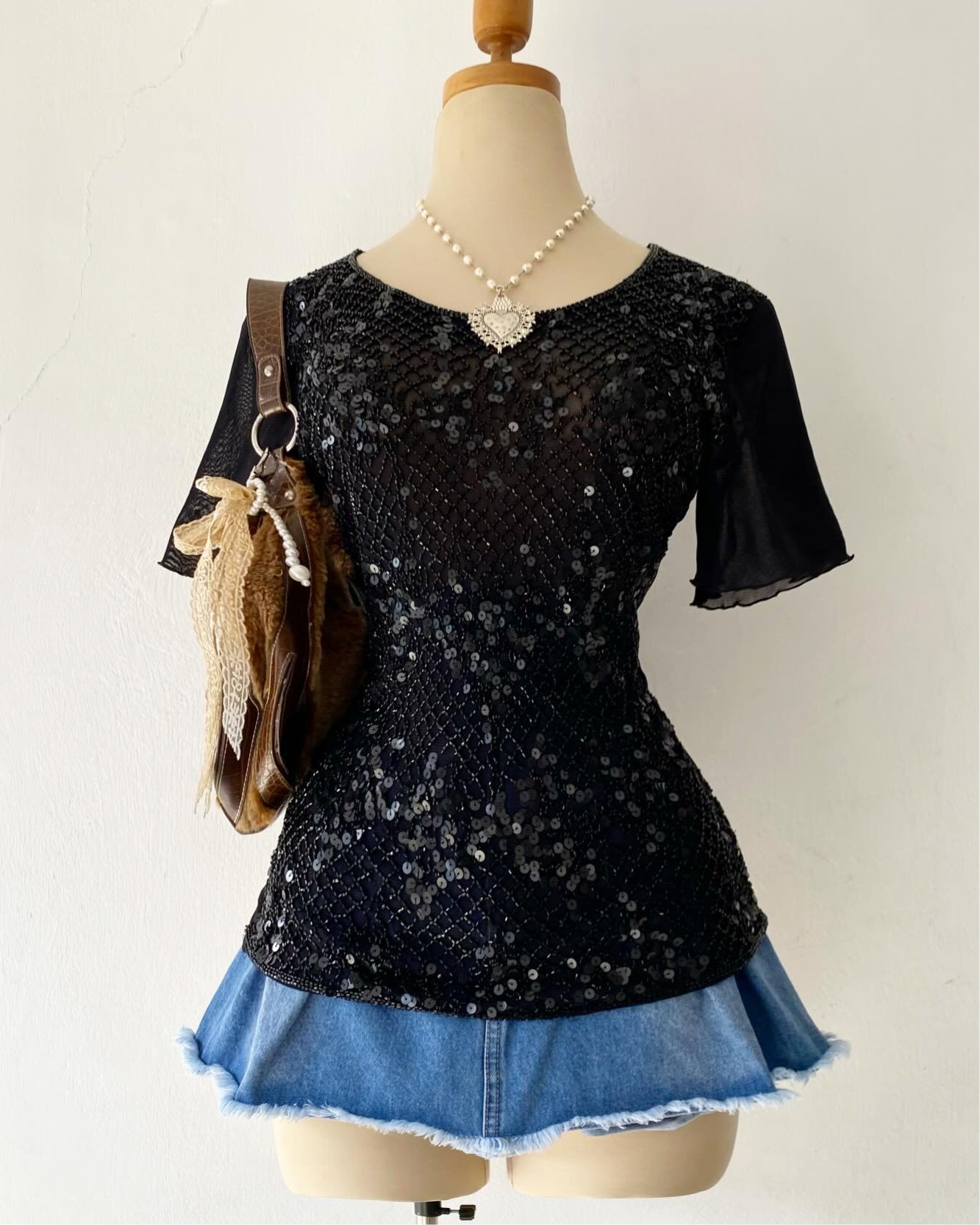 Black sequin-embroidered top