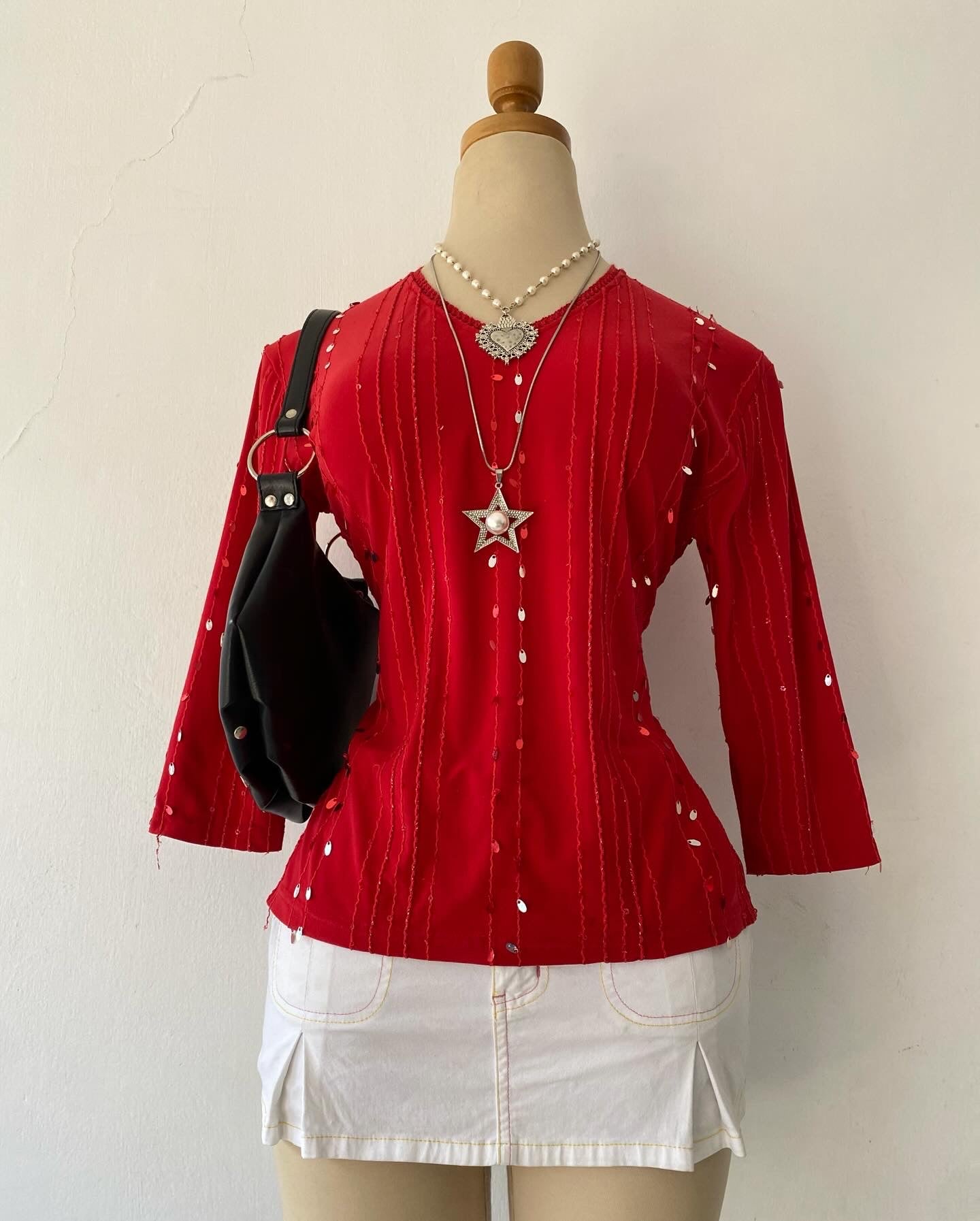 Red top with sequins