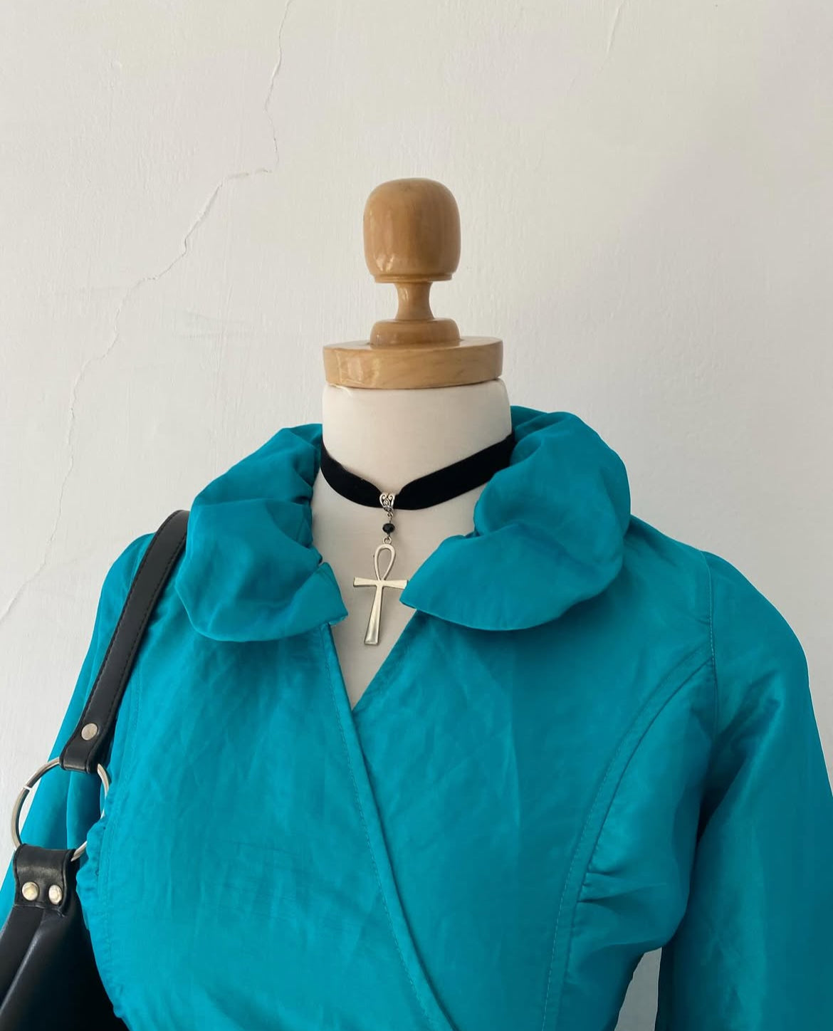 Turquoise blouse with bow