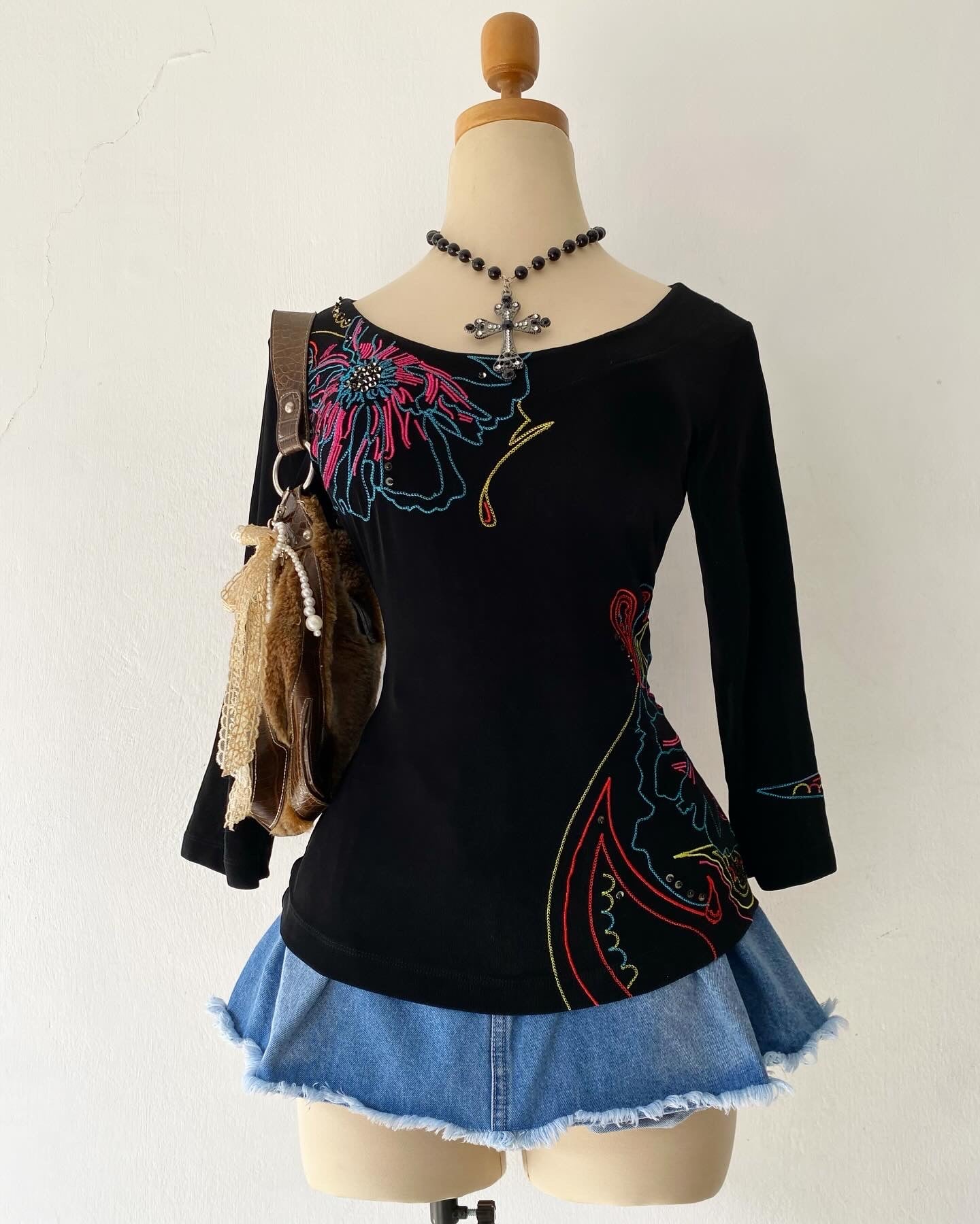 Top with orchid embroidery