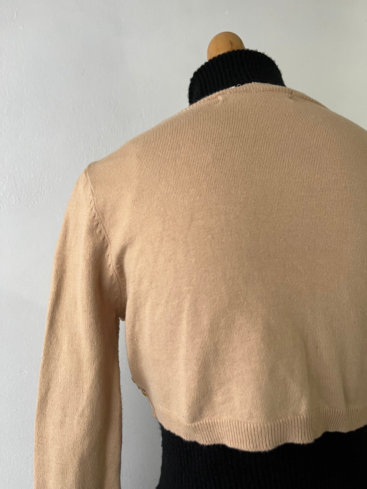 Beige knitted cardigan with hand embroidery