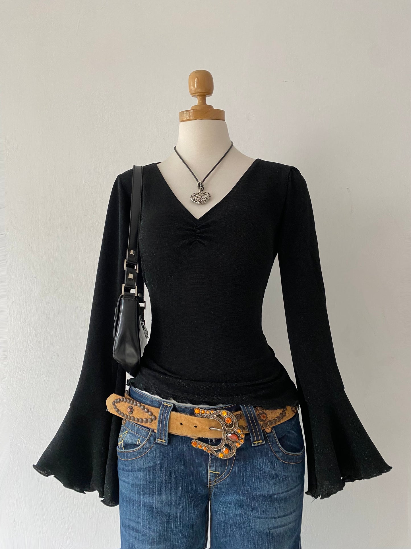 Bell-sleeved top
