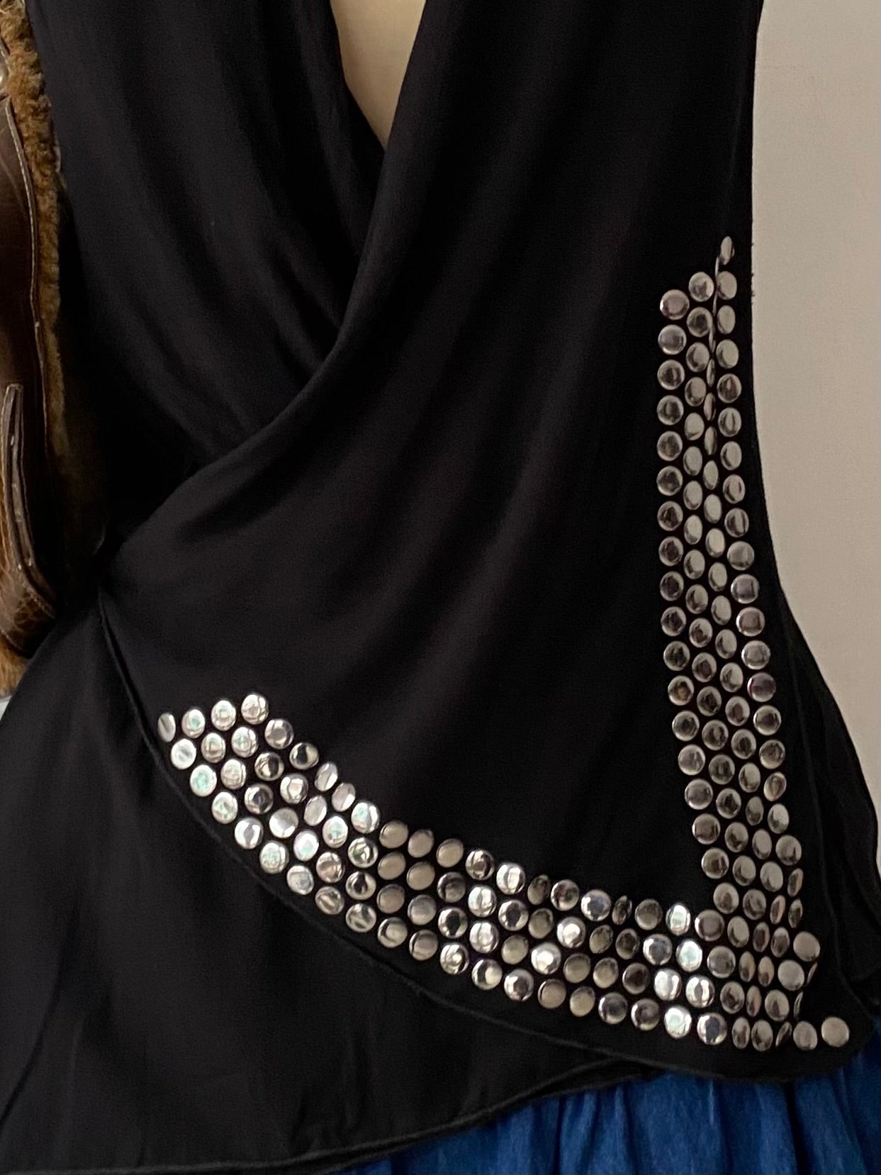 Black top with silver appliqués