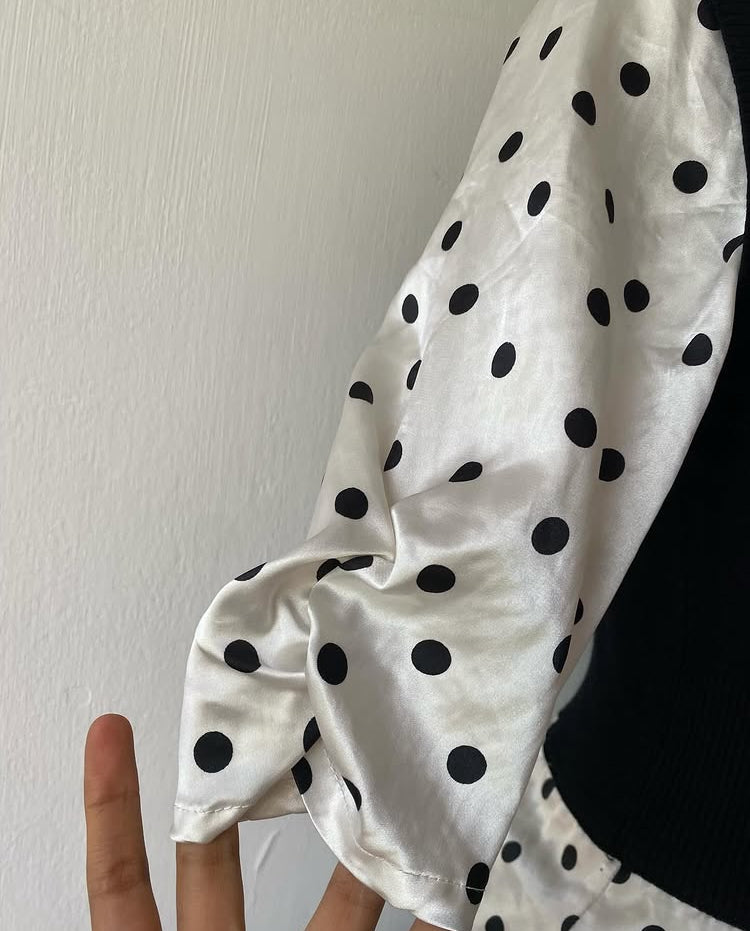 Polka dot top with knitted vest