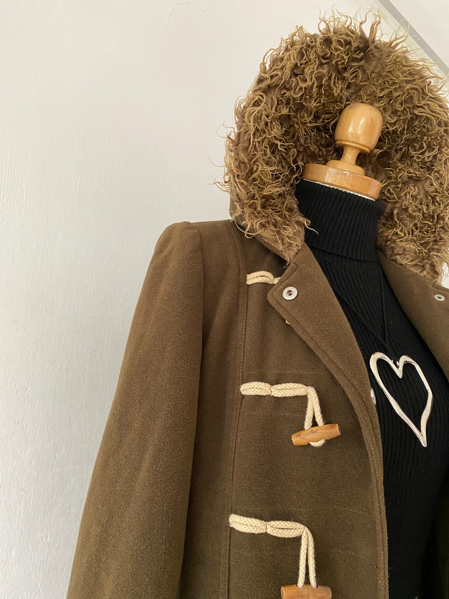 Jacket with lamb on sleeves and hood