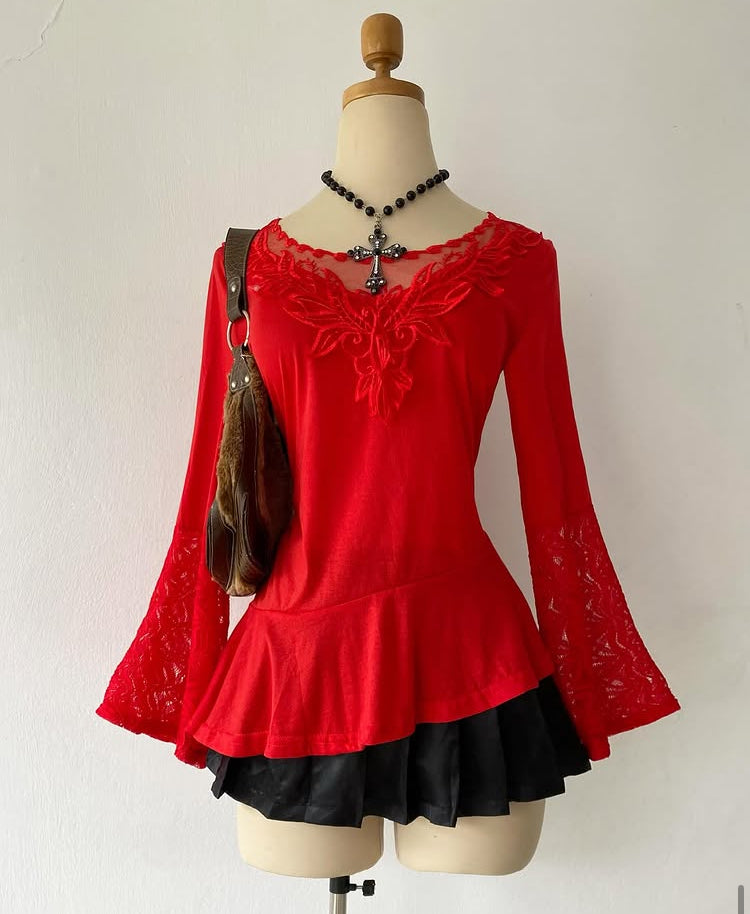 Bell-sleeved red top