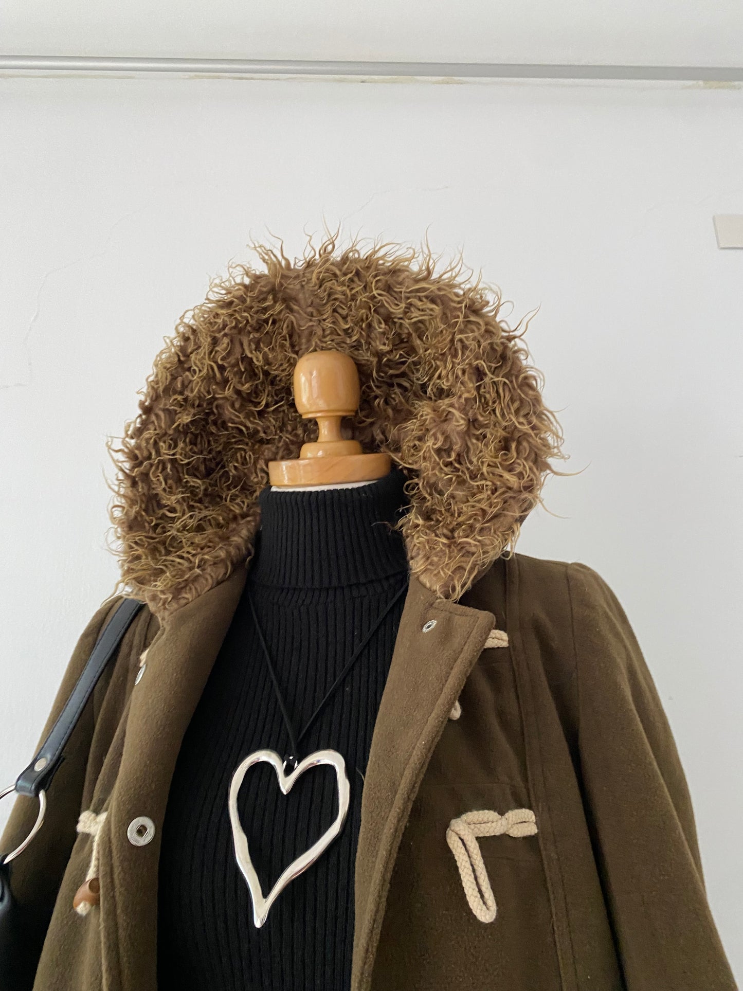 Jacket with lamb on sleeves and hood