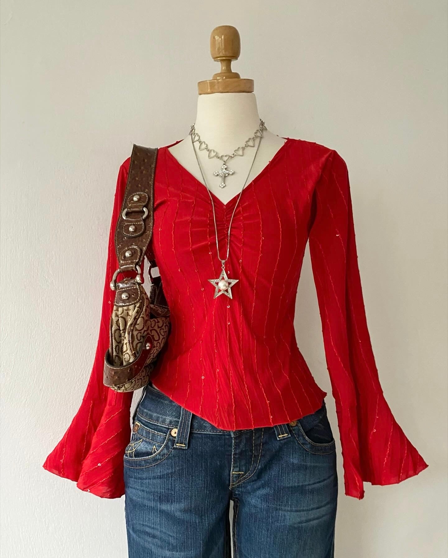 Bell-sleeved red top with sequins