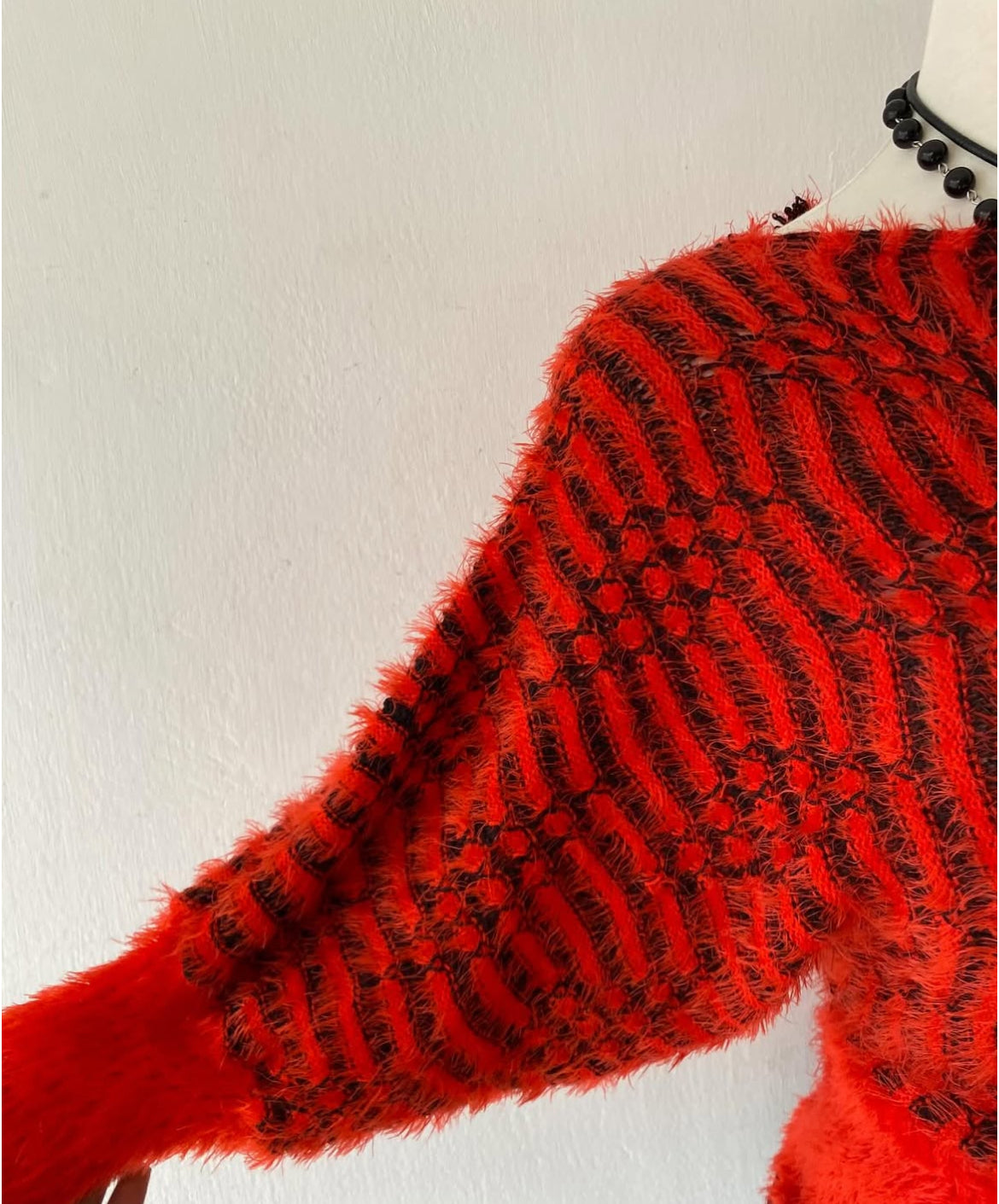 Red and black sweater