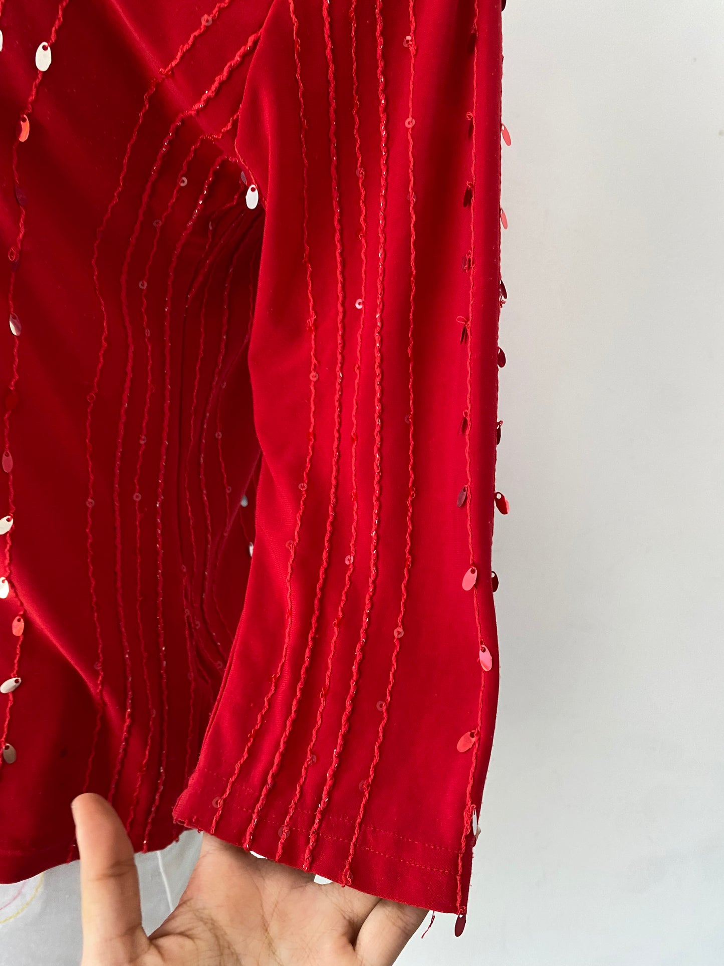 Red top with sequins