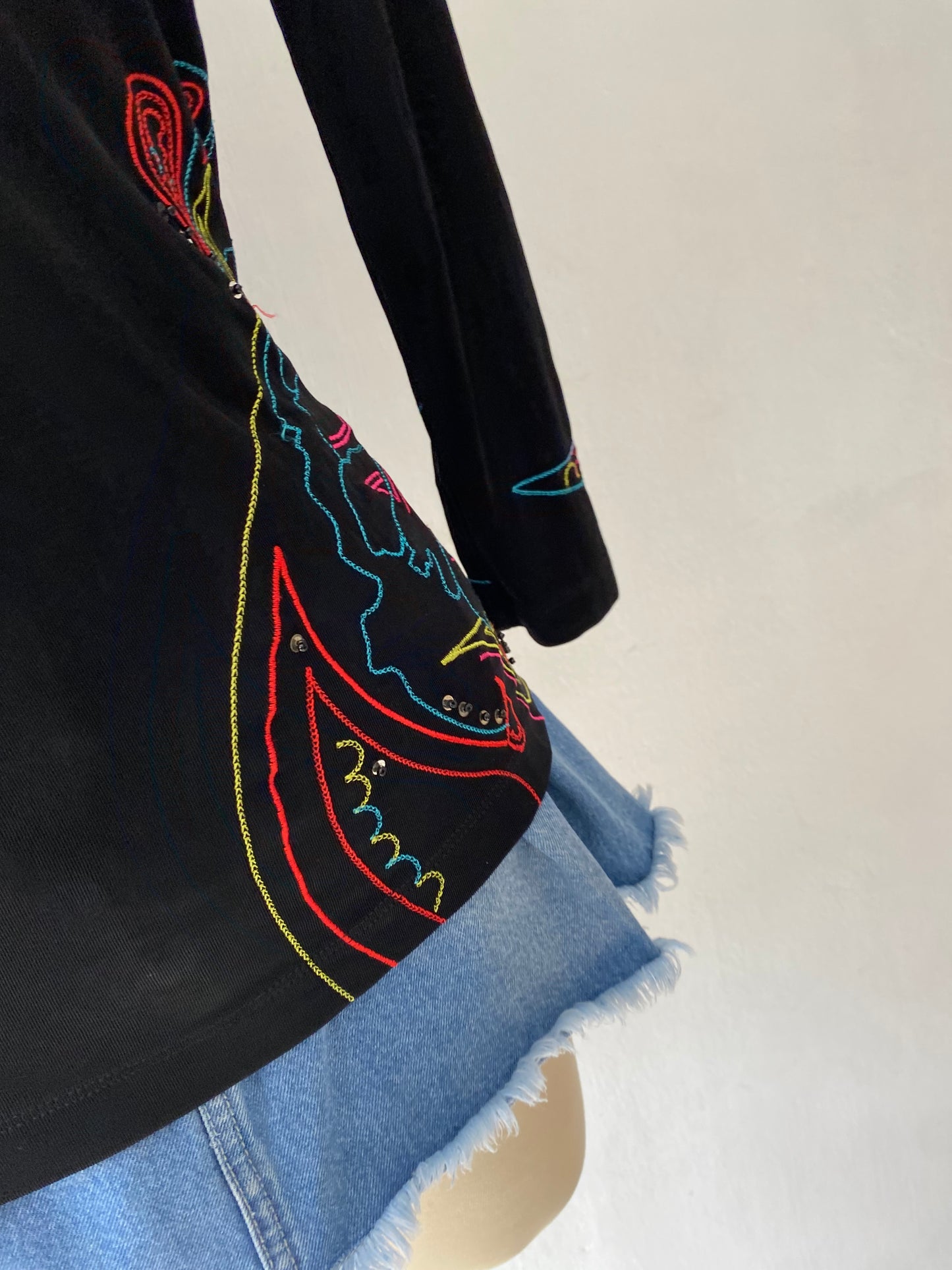 Top with orchid embroidery