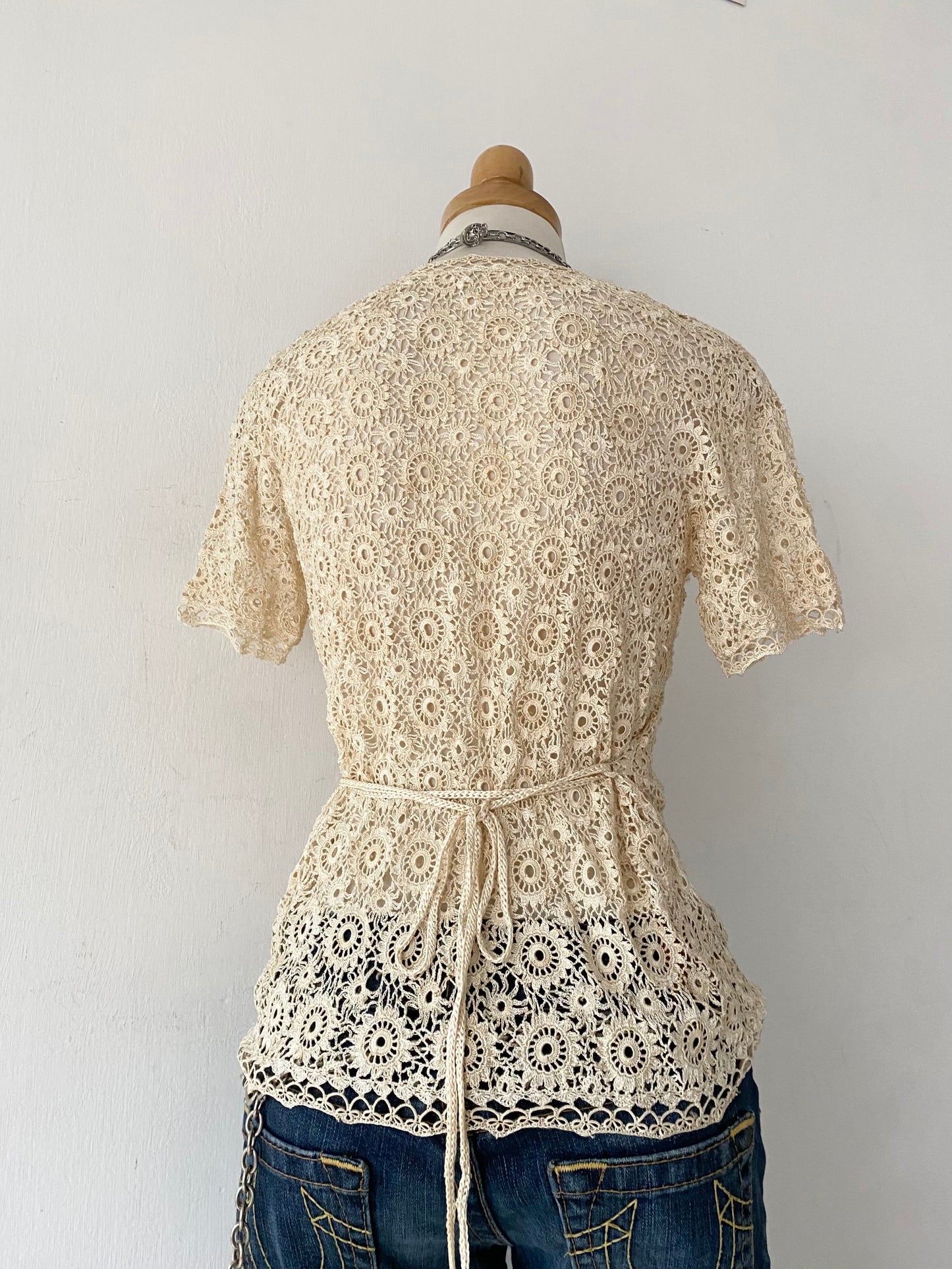 Knitted macrame top with back bow