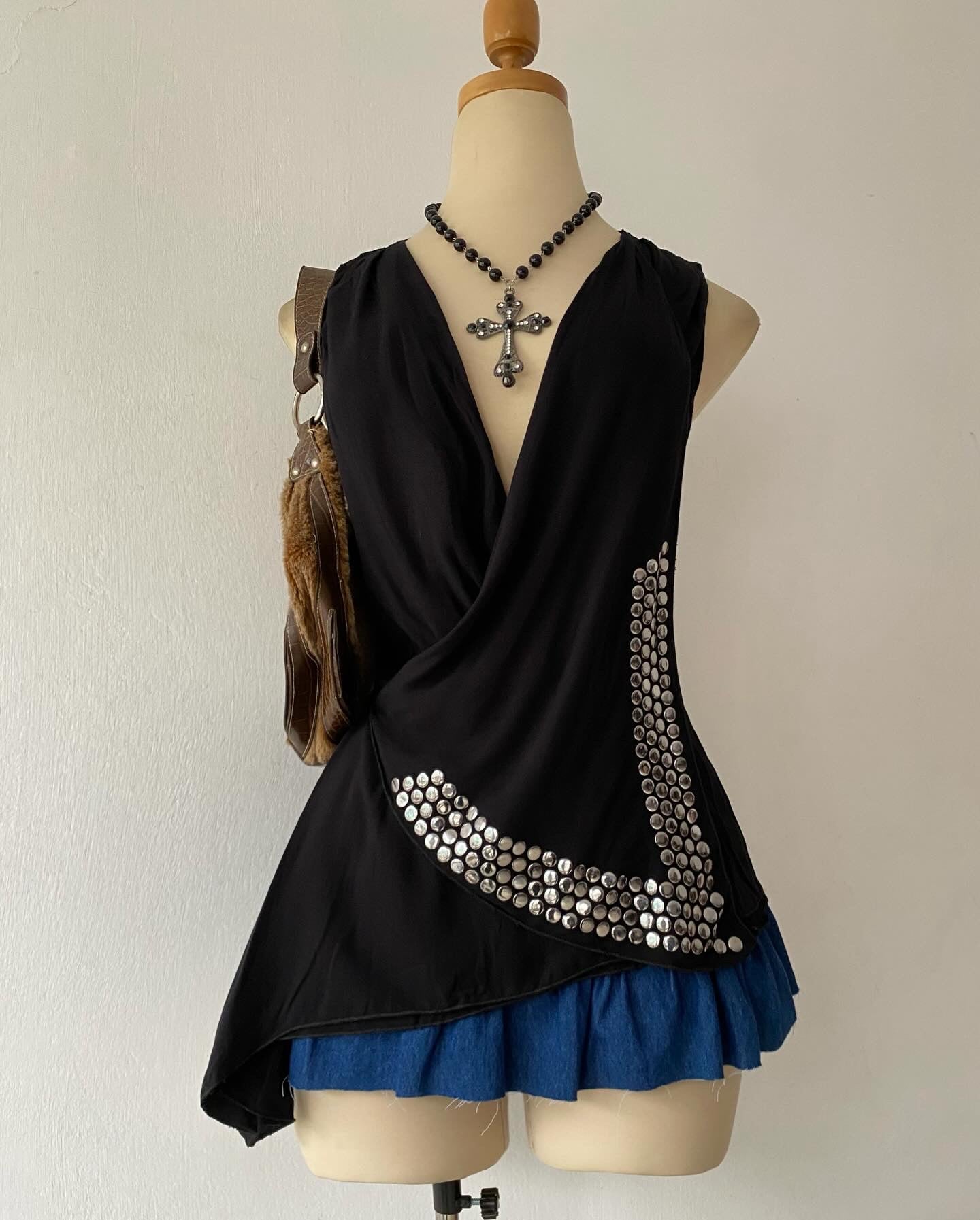 Black top with silver appliqués