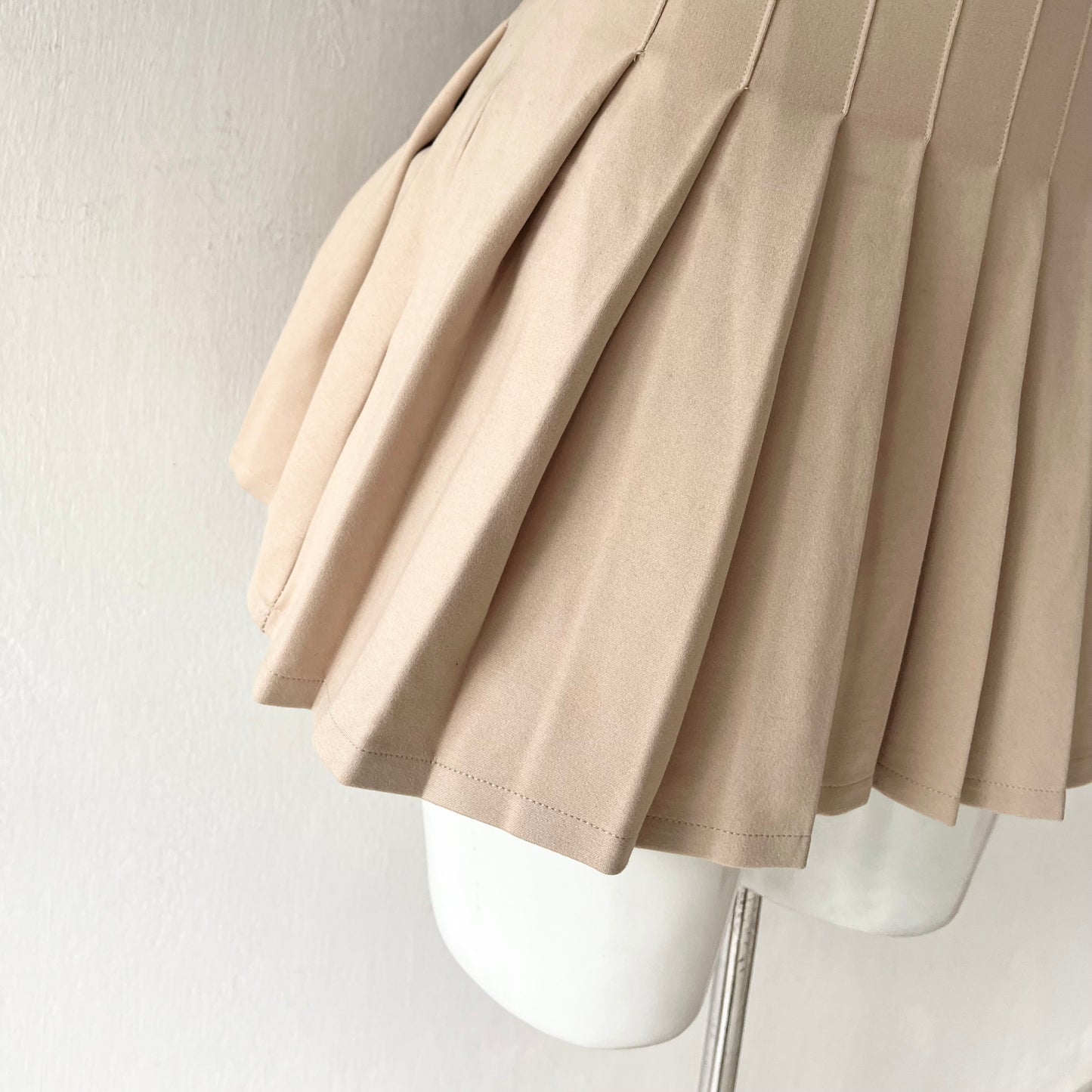 Beige pleated skirt