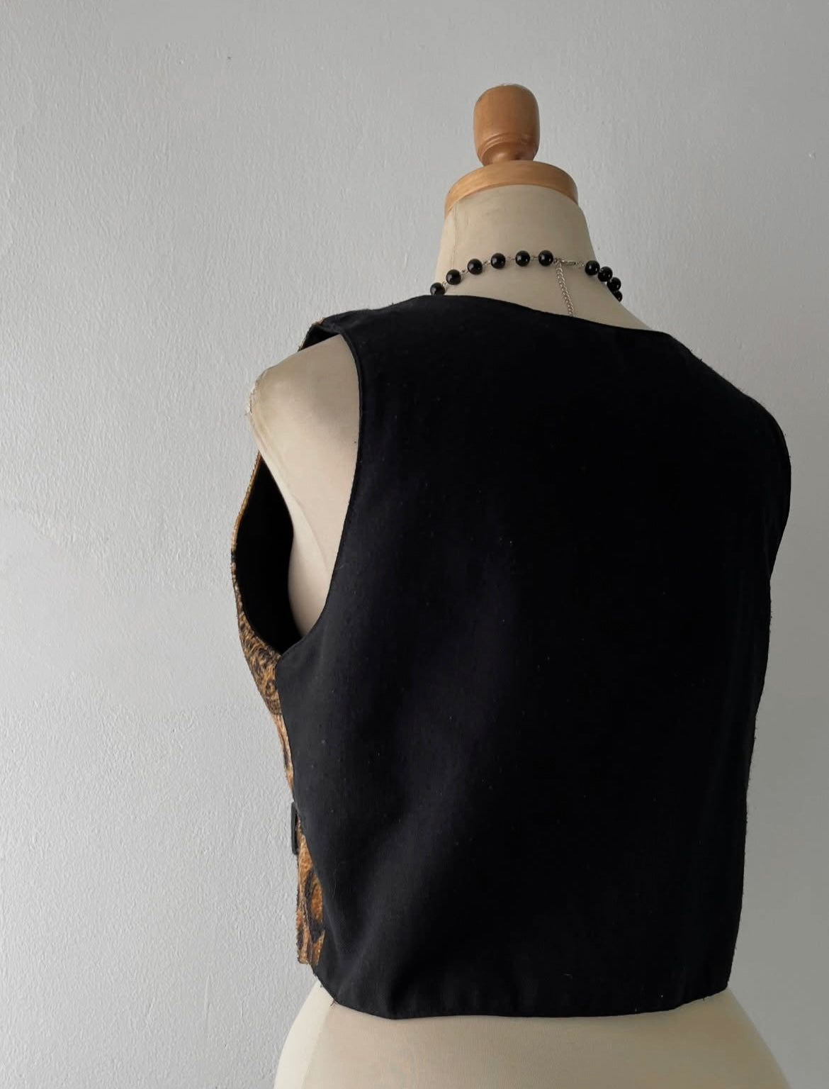 Reversible vest(cheetah print vest - black vest)