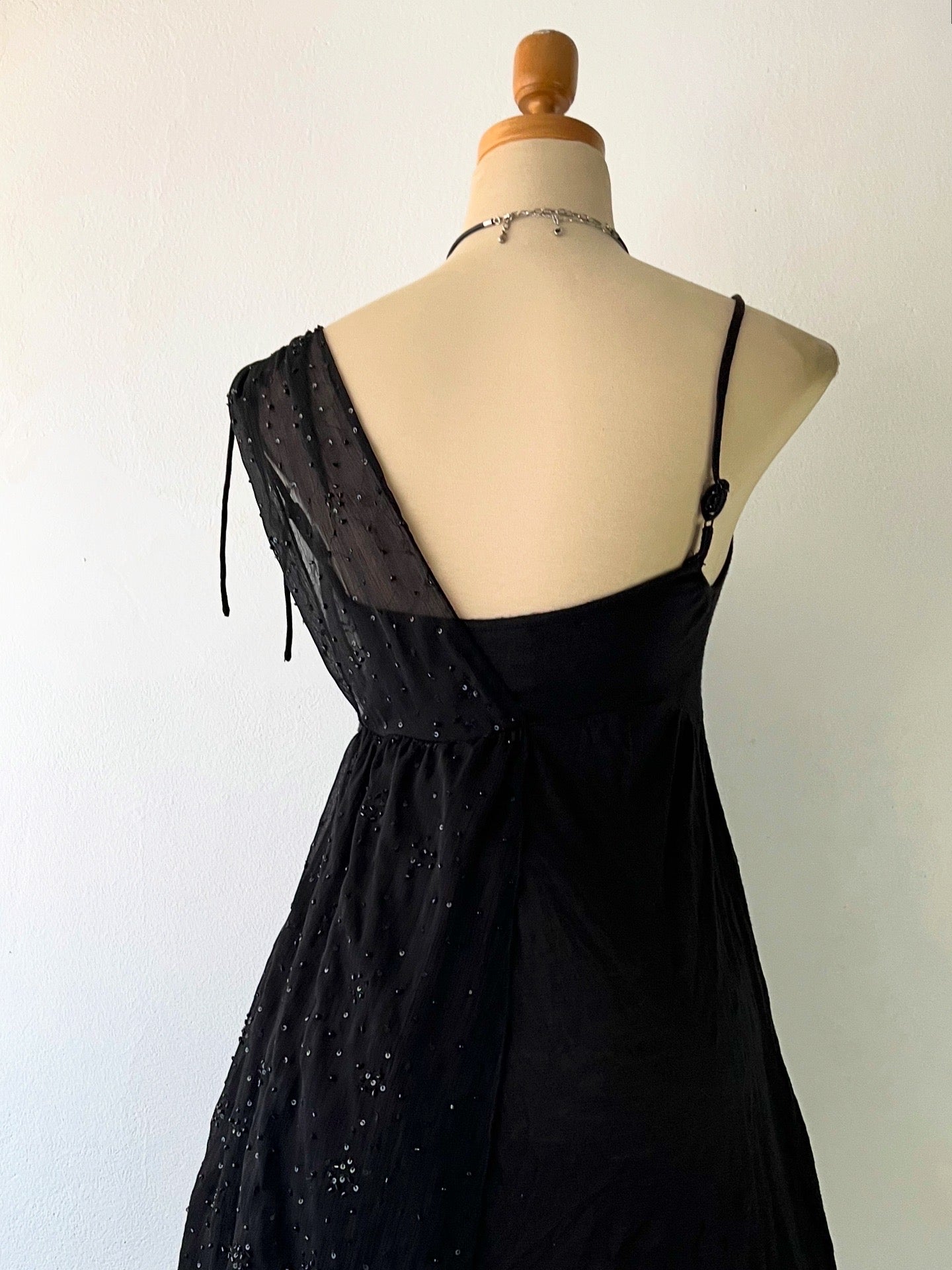 Adorable black top with sequins