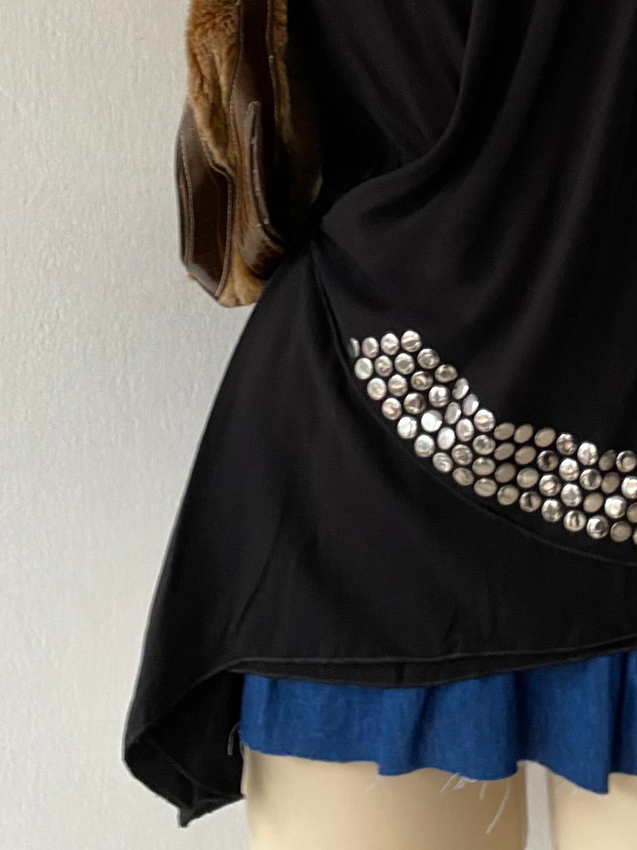 Black top with silver appliqués