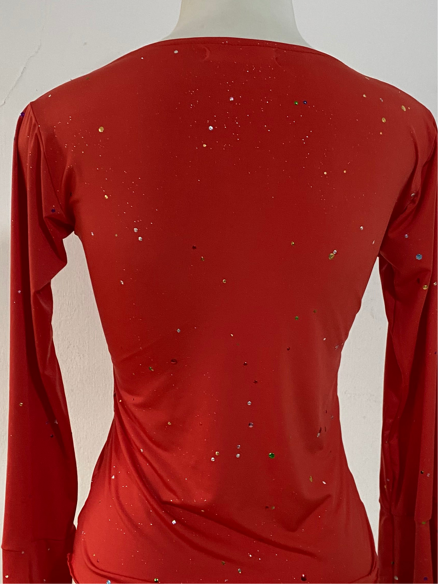 Bell-sleeved top with appliqués
