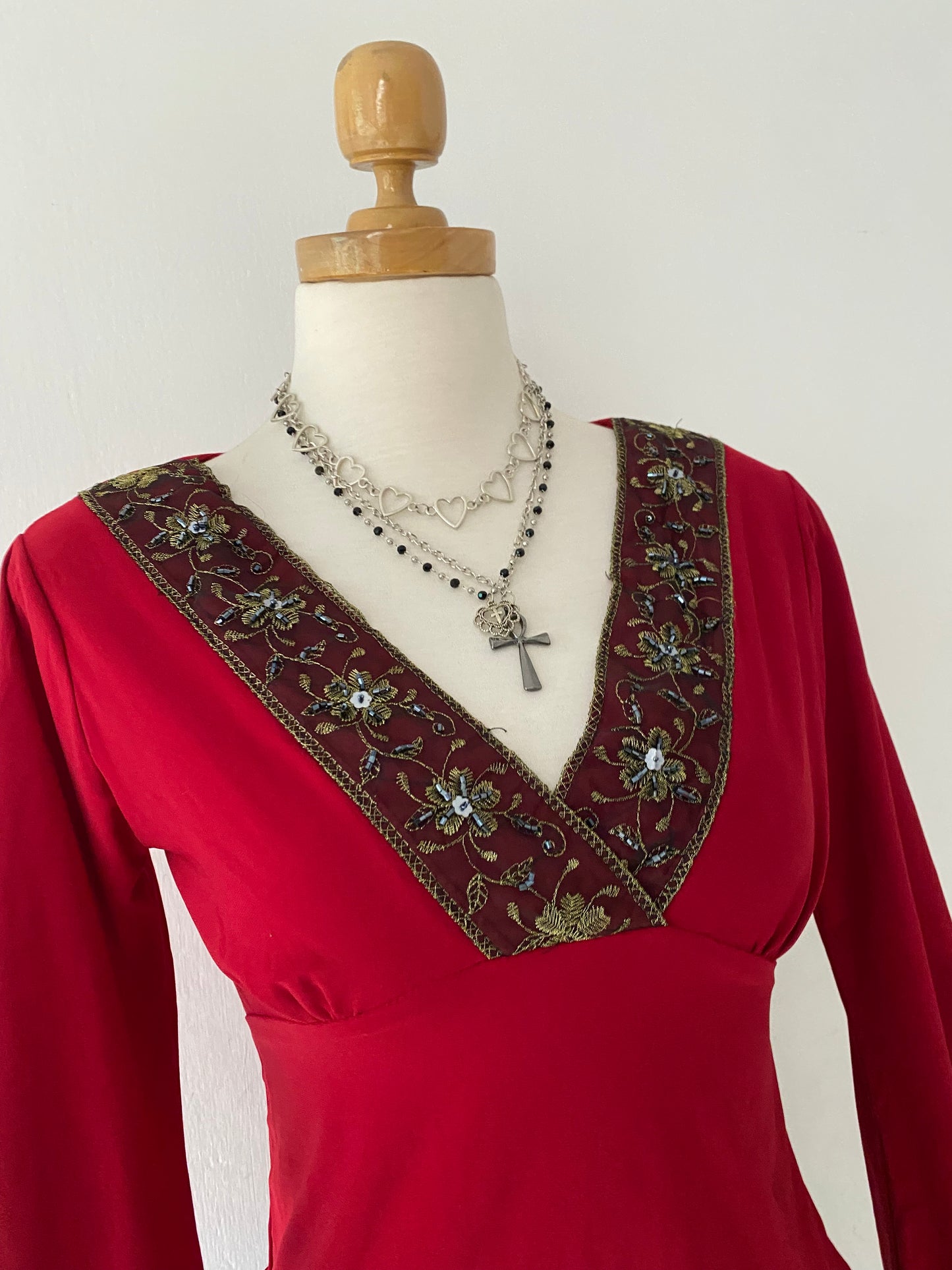 Bell-sleveed burgundy top
