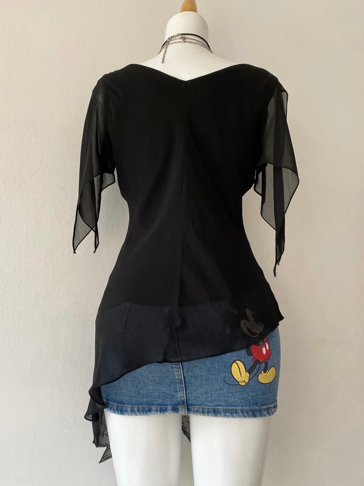Black asymmetrical fairy top