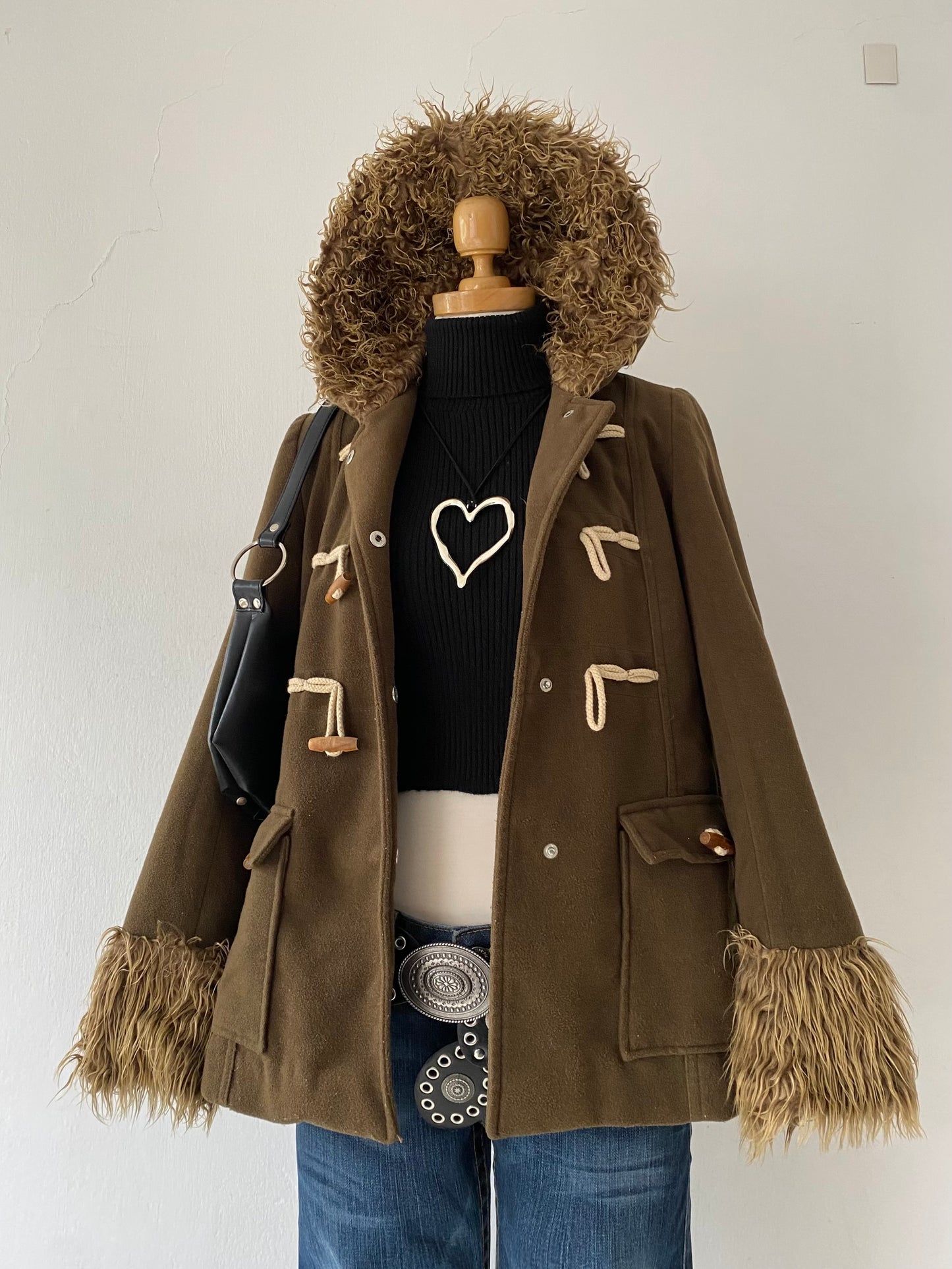 Jacket with lamb on sleeves and hood