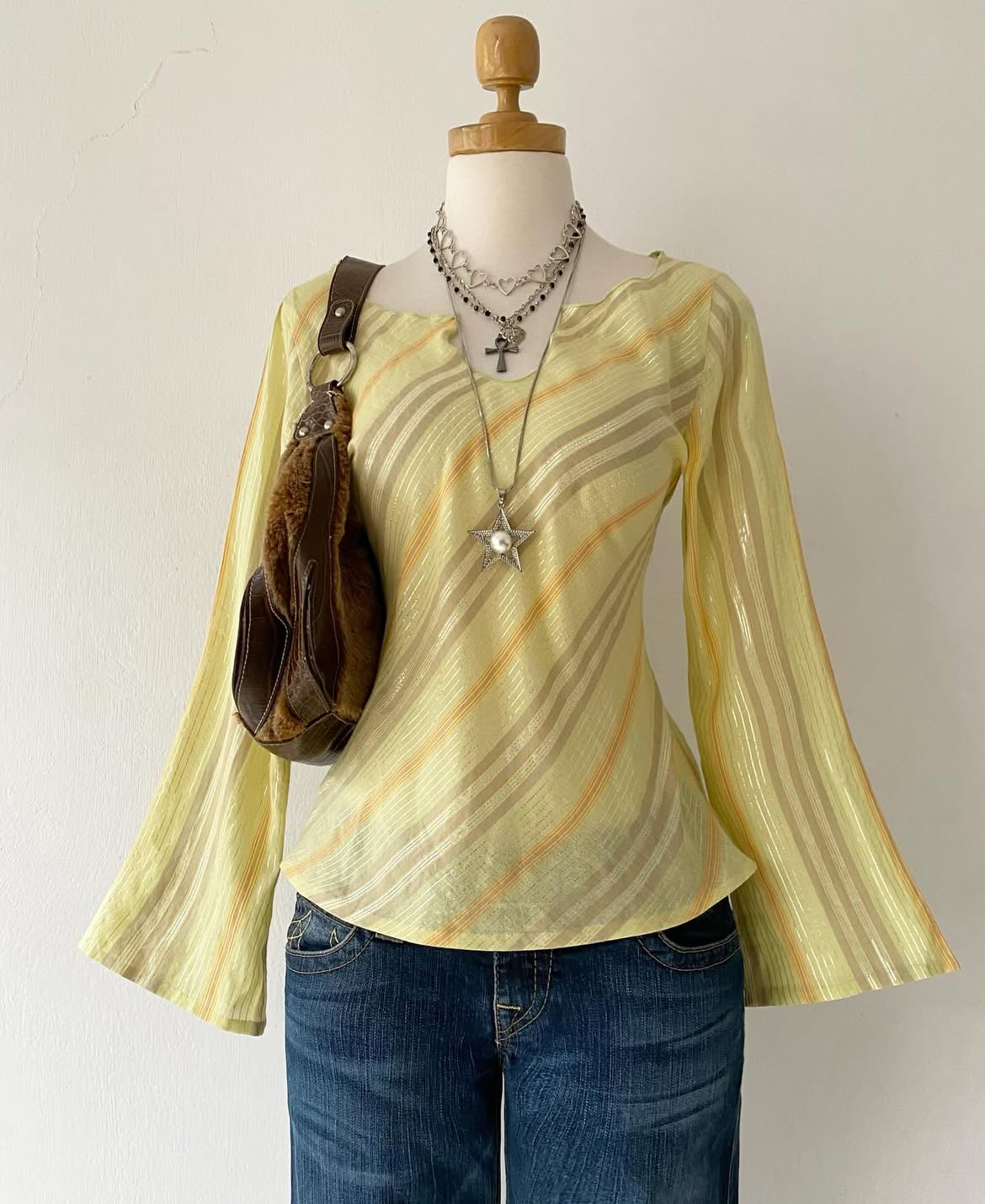 Striped bell-sleeved top