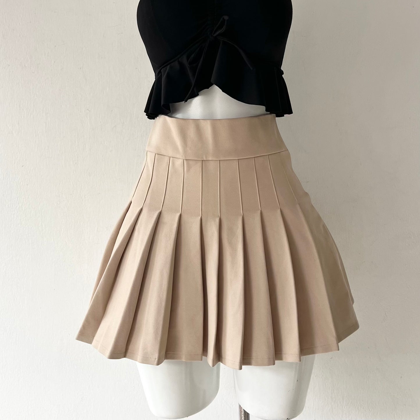 Beige pleated skirt