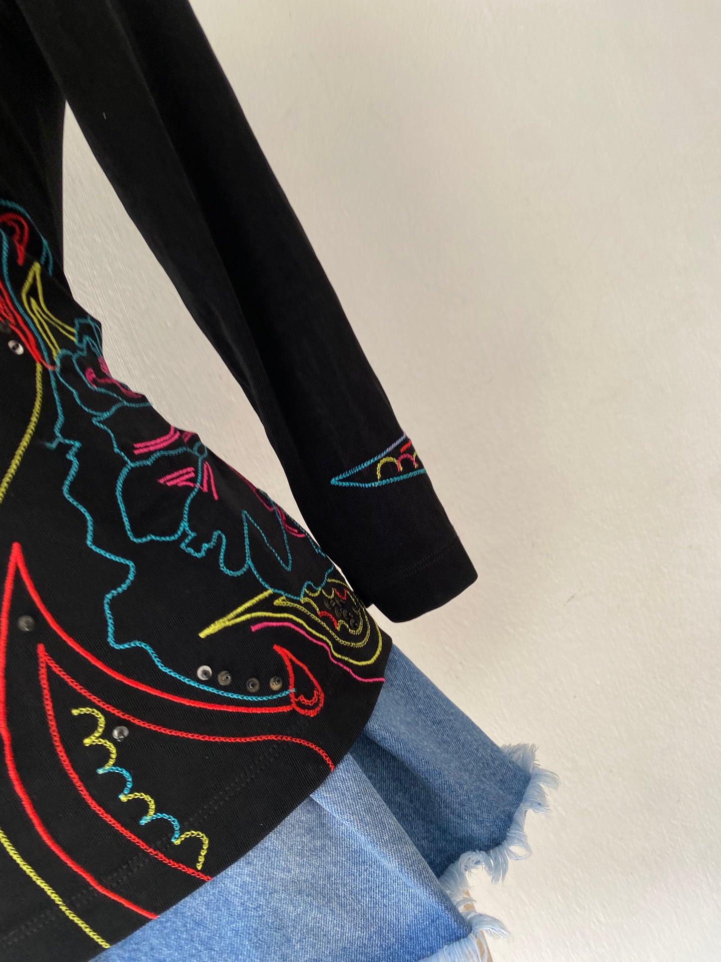 Top with orchid embroidery