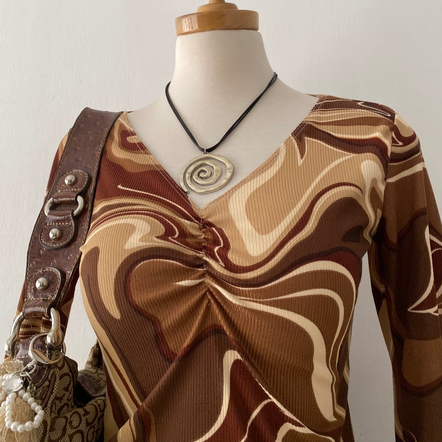 Bell-sleveed top