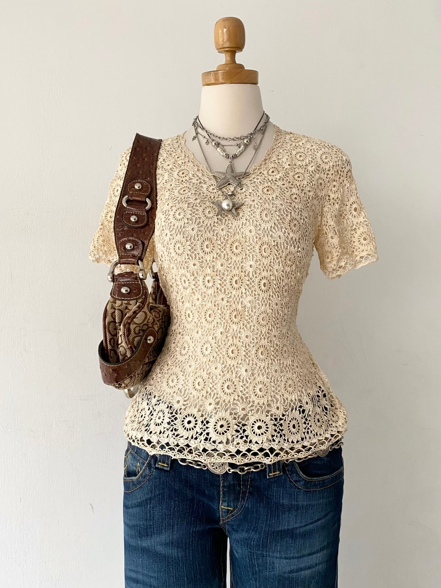 Knitted macrame top with back bow
