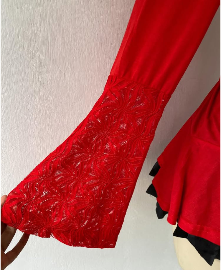 Bell-sleeved red top