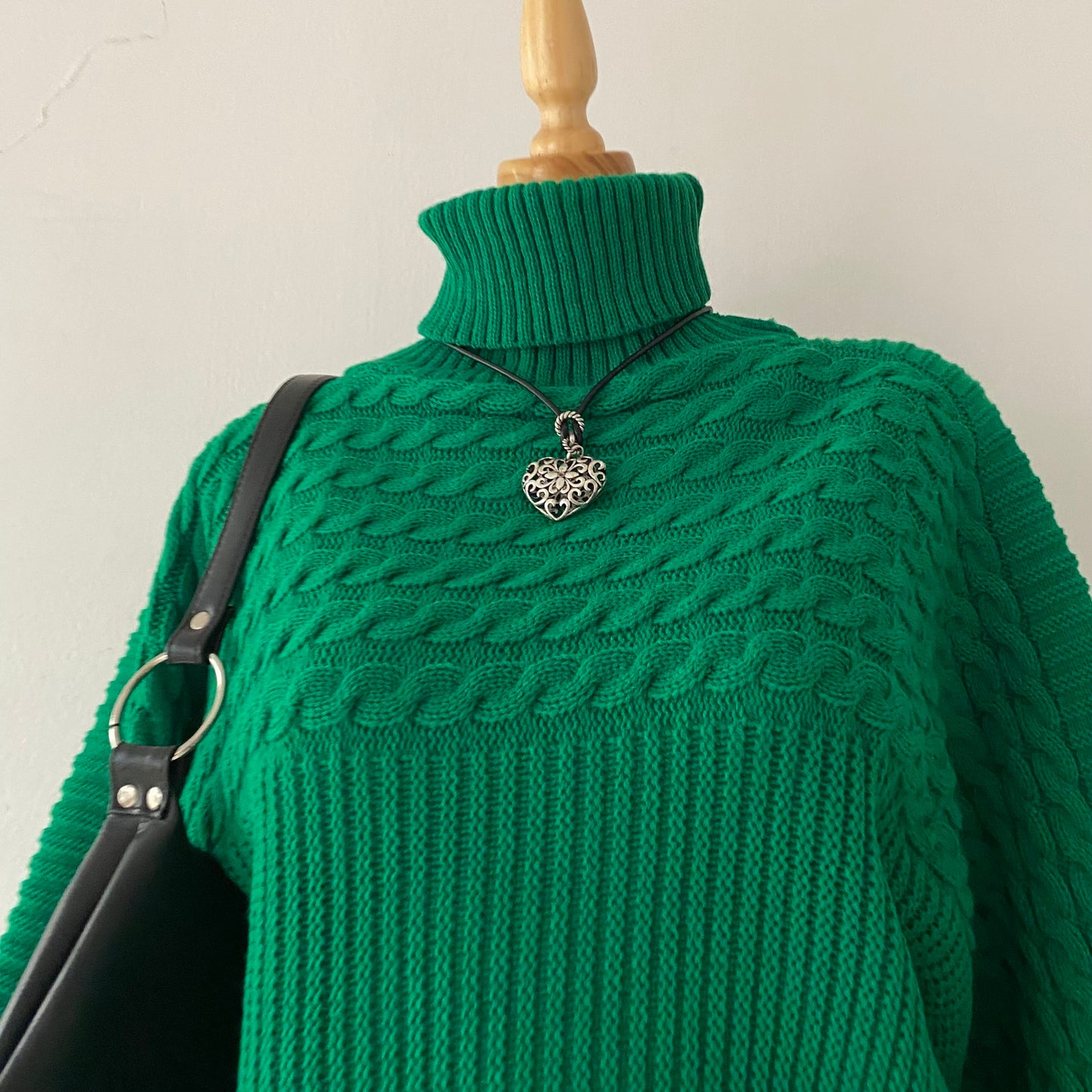 Oversized sweater with braided design