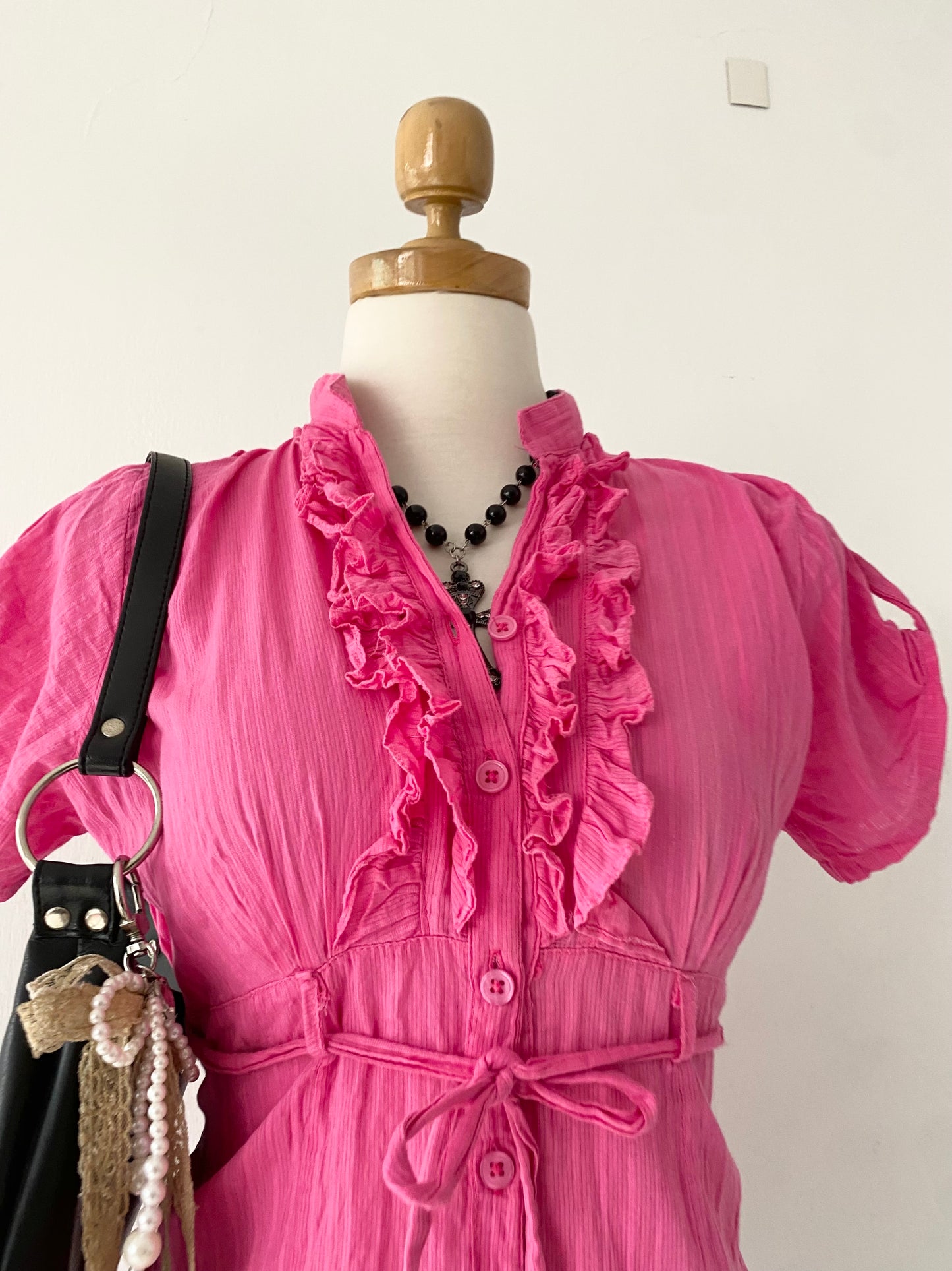 Pink top with bow