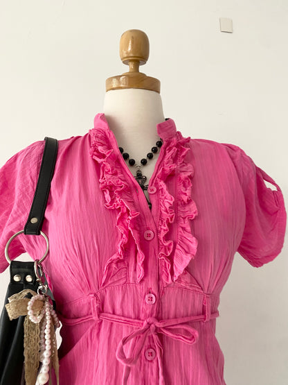 Pink top with bow
