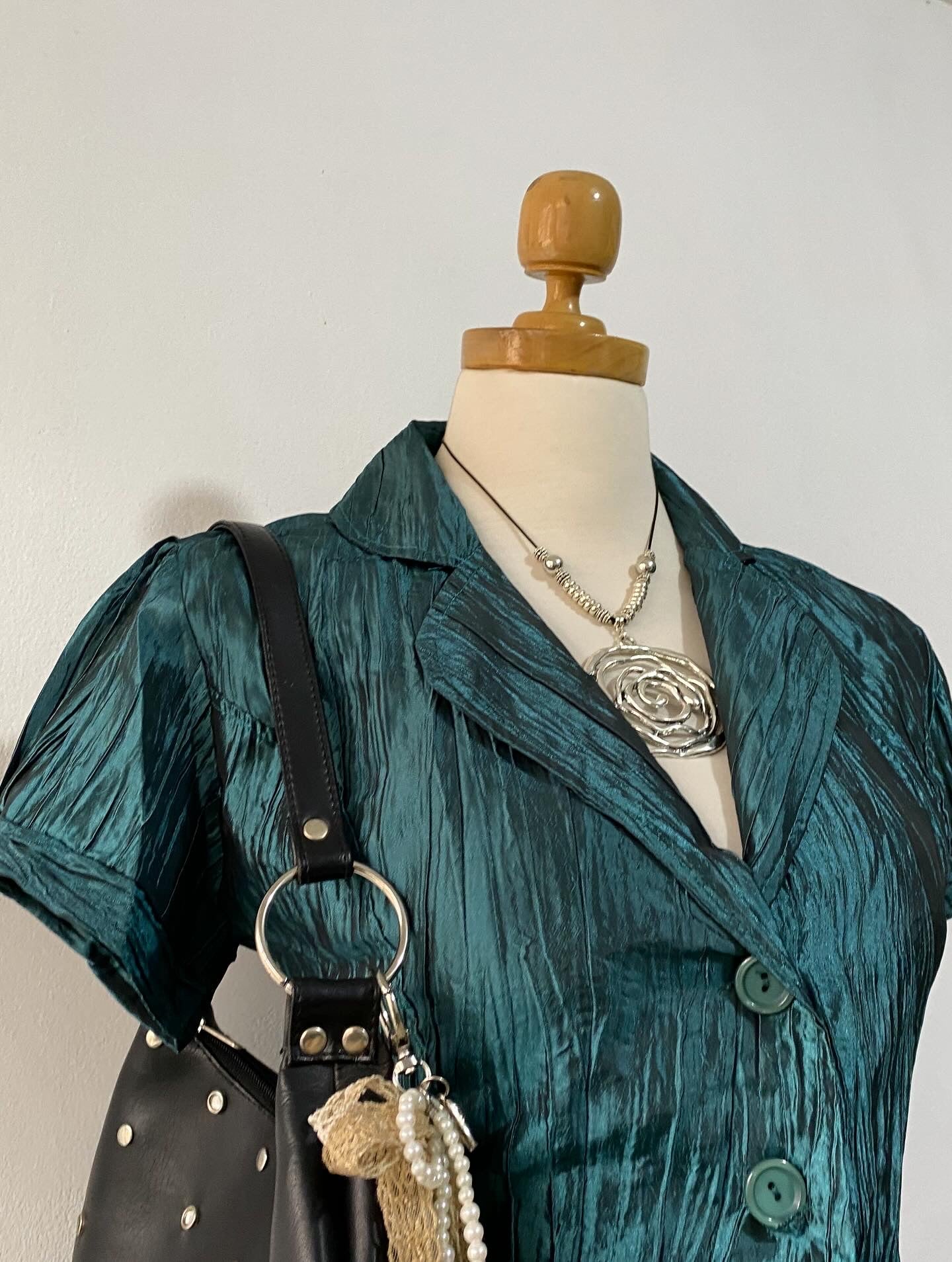 Iridescent green top