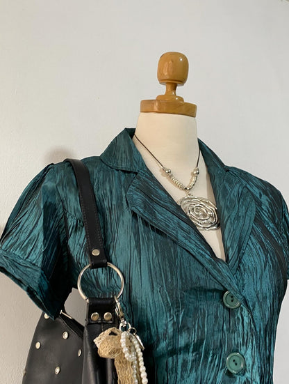 Iridescent green top