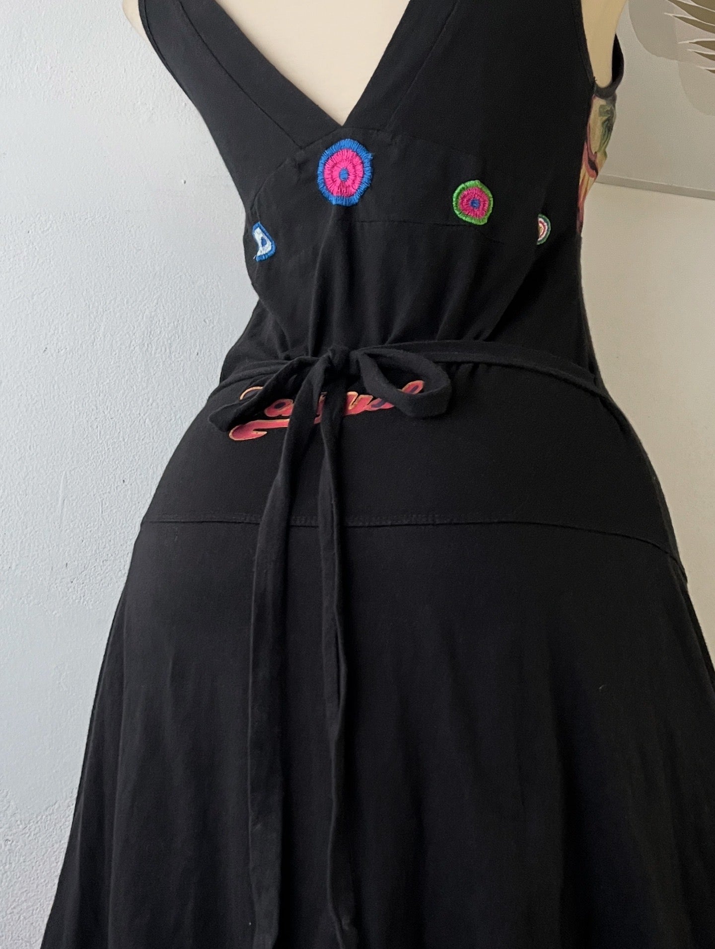 Adorable bohemian dress with a back bow