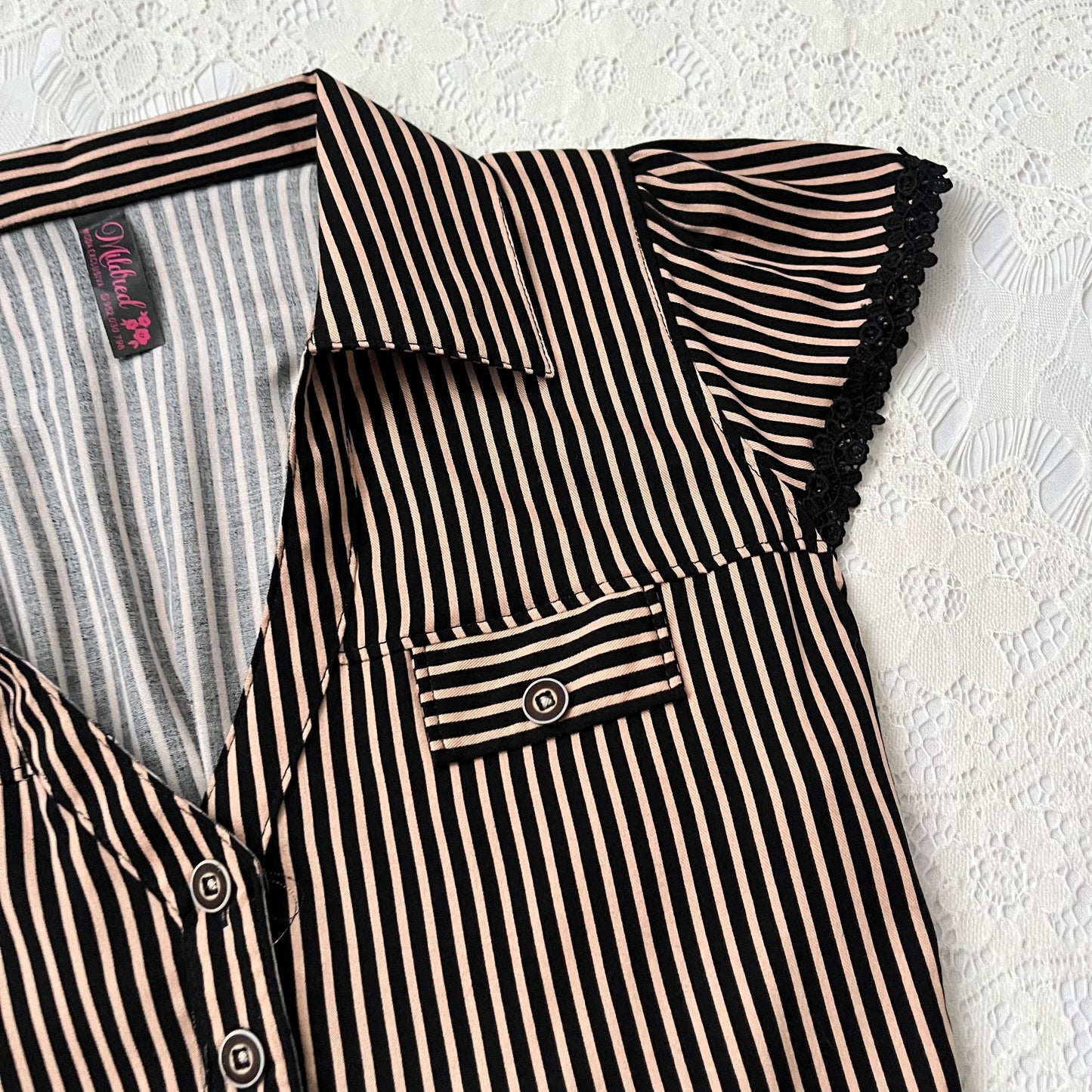 Striped top with bow