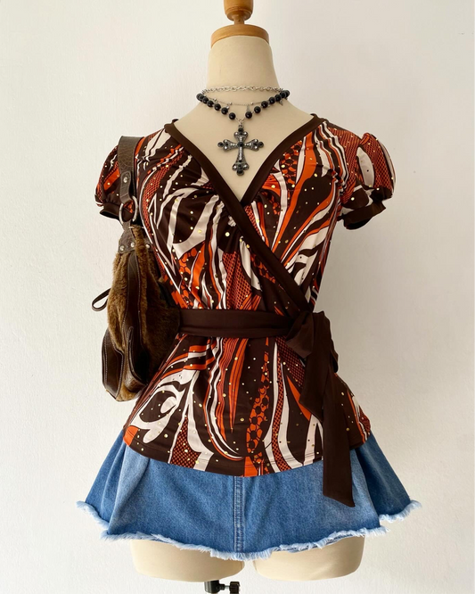 Adorable wrap top with bow