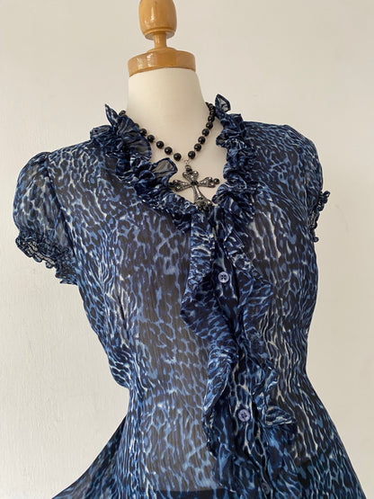 Cheetah print blouse with bow on the back