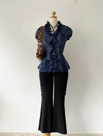 Cheetah print blouse with bow on the back