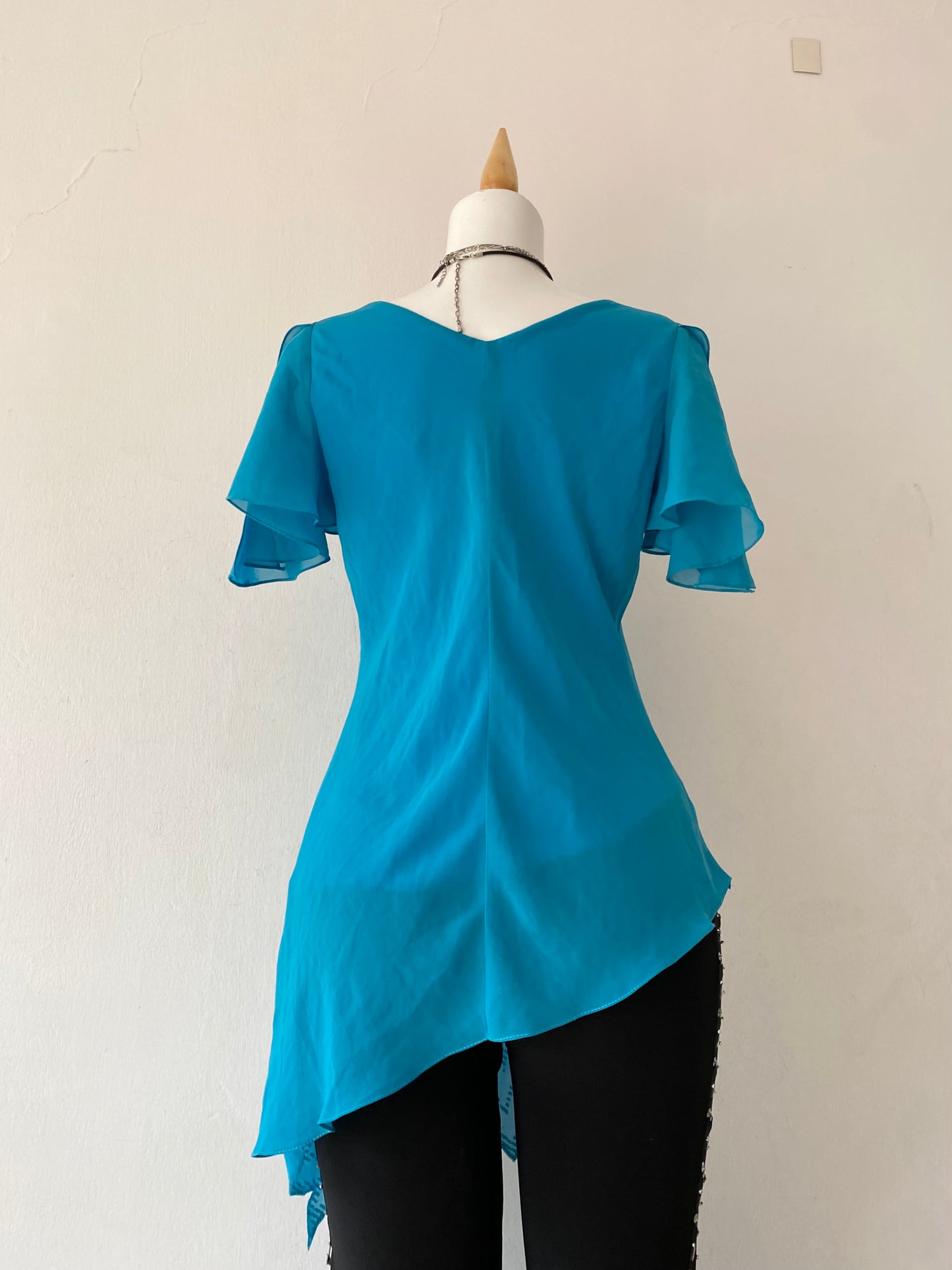 Light blue asymmetrical blouse