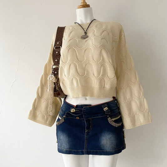Pearl waist sweater with interwoven design