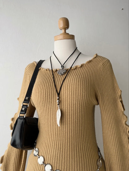 Wide-sleeved sweater